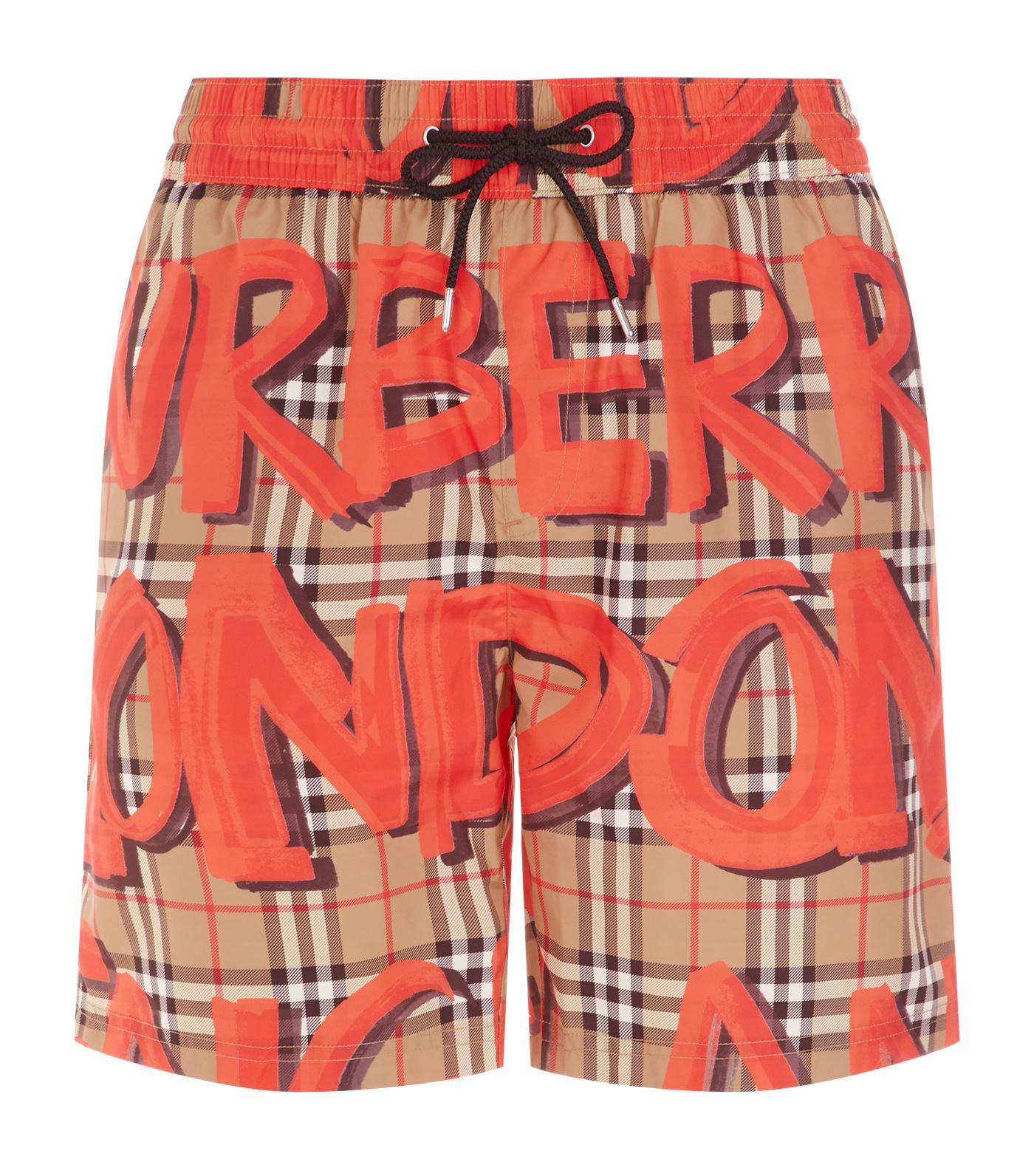 red burberry swim trunks