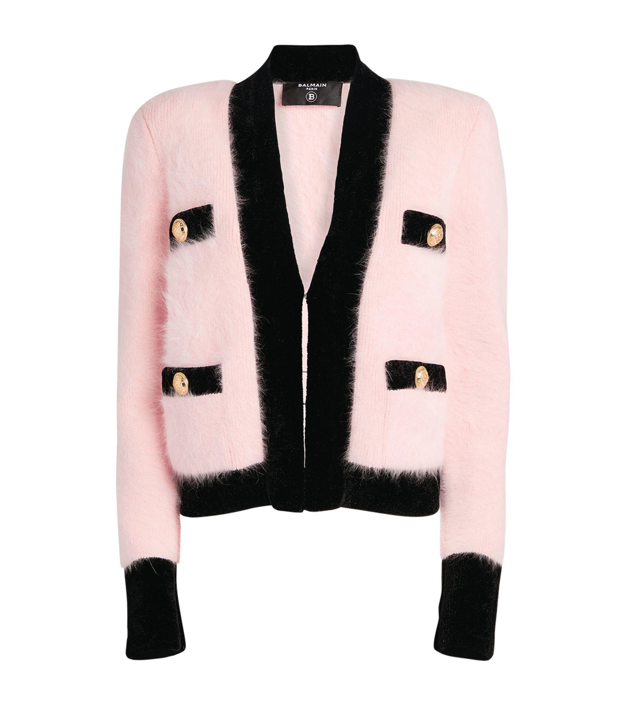 pink cardigan with black trim