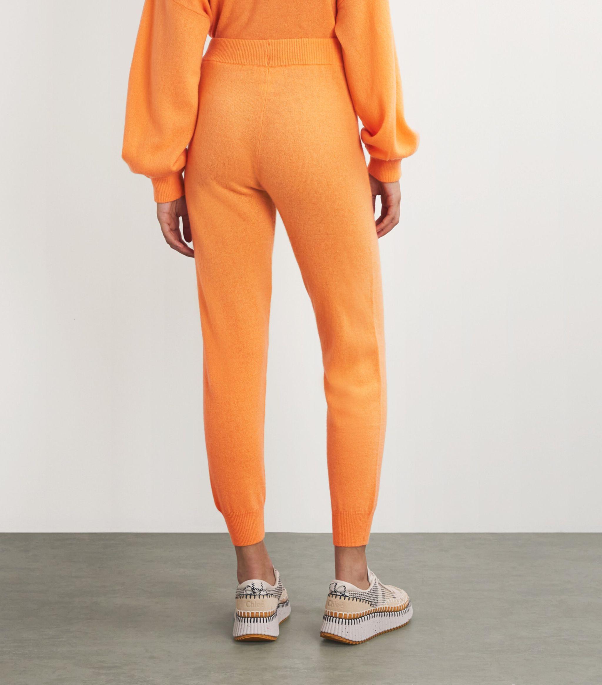 Orange Track pants and sweatpants for Women Lyst
