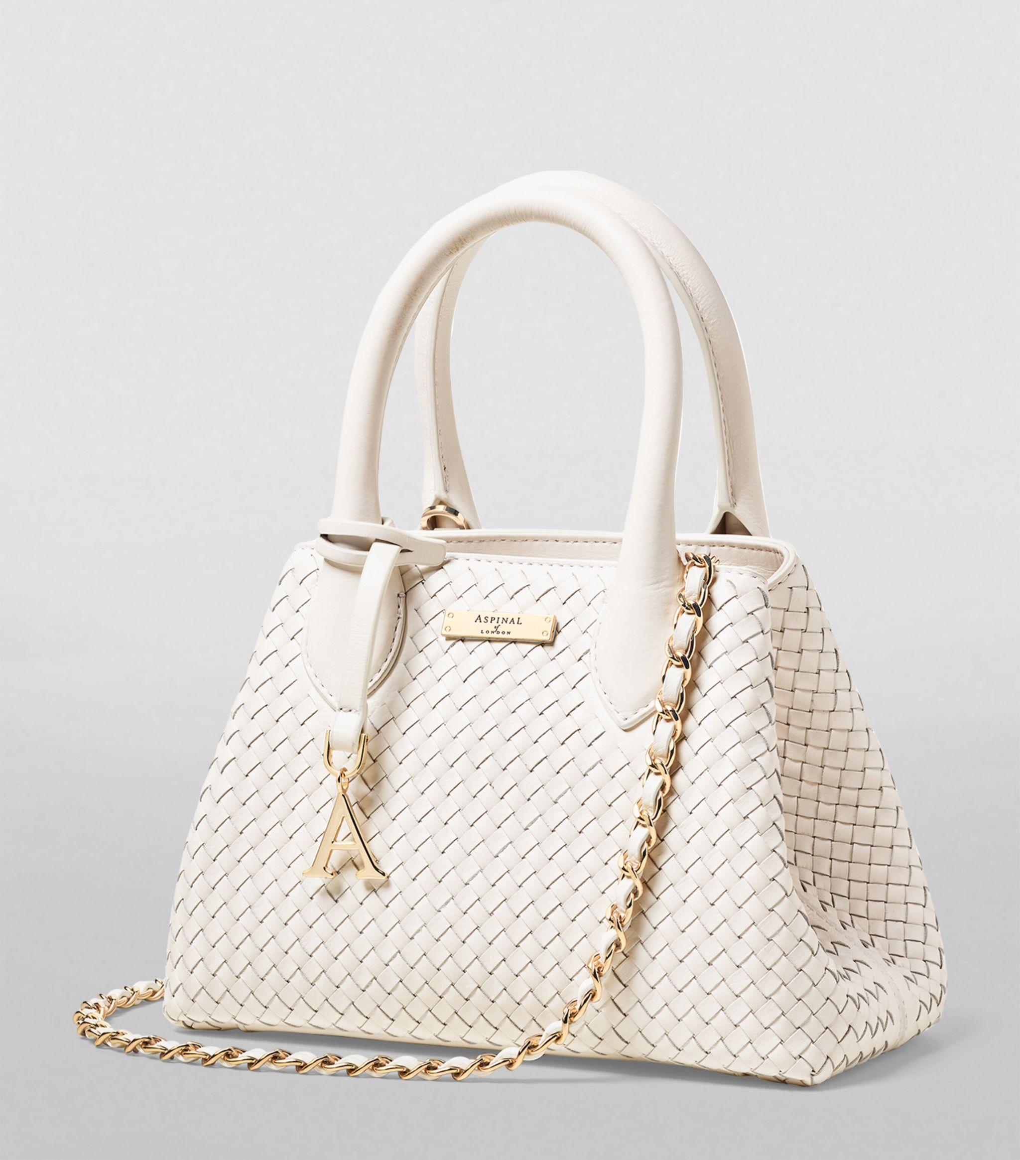 Discover 127+ white hand bag 3tdesign.edu.vn