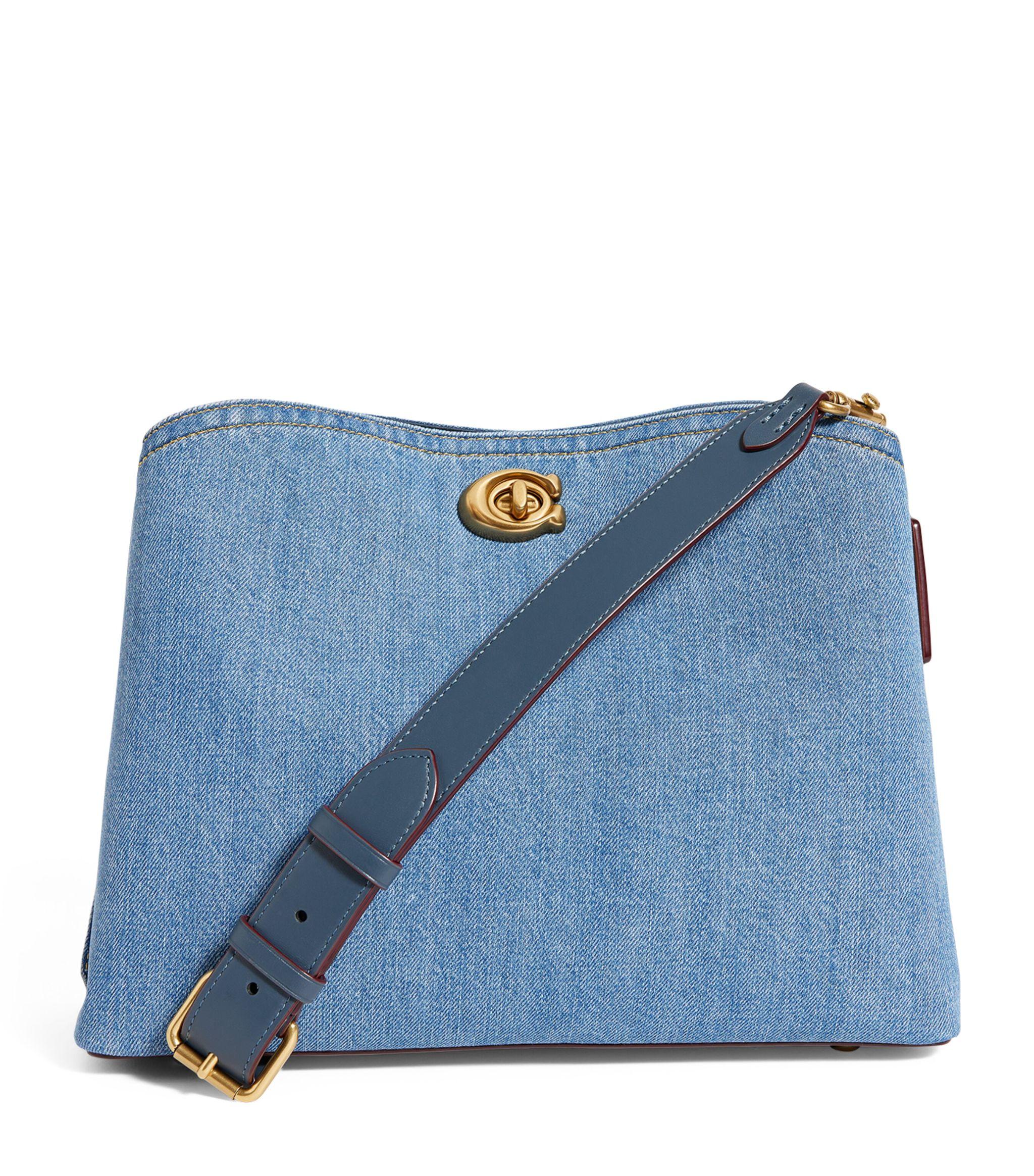 This Coach Denim Bag Is SIIIIngly Too Sleek to Be Just a Bag