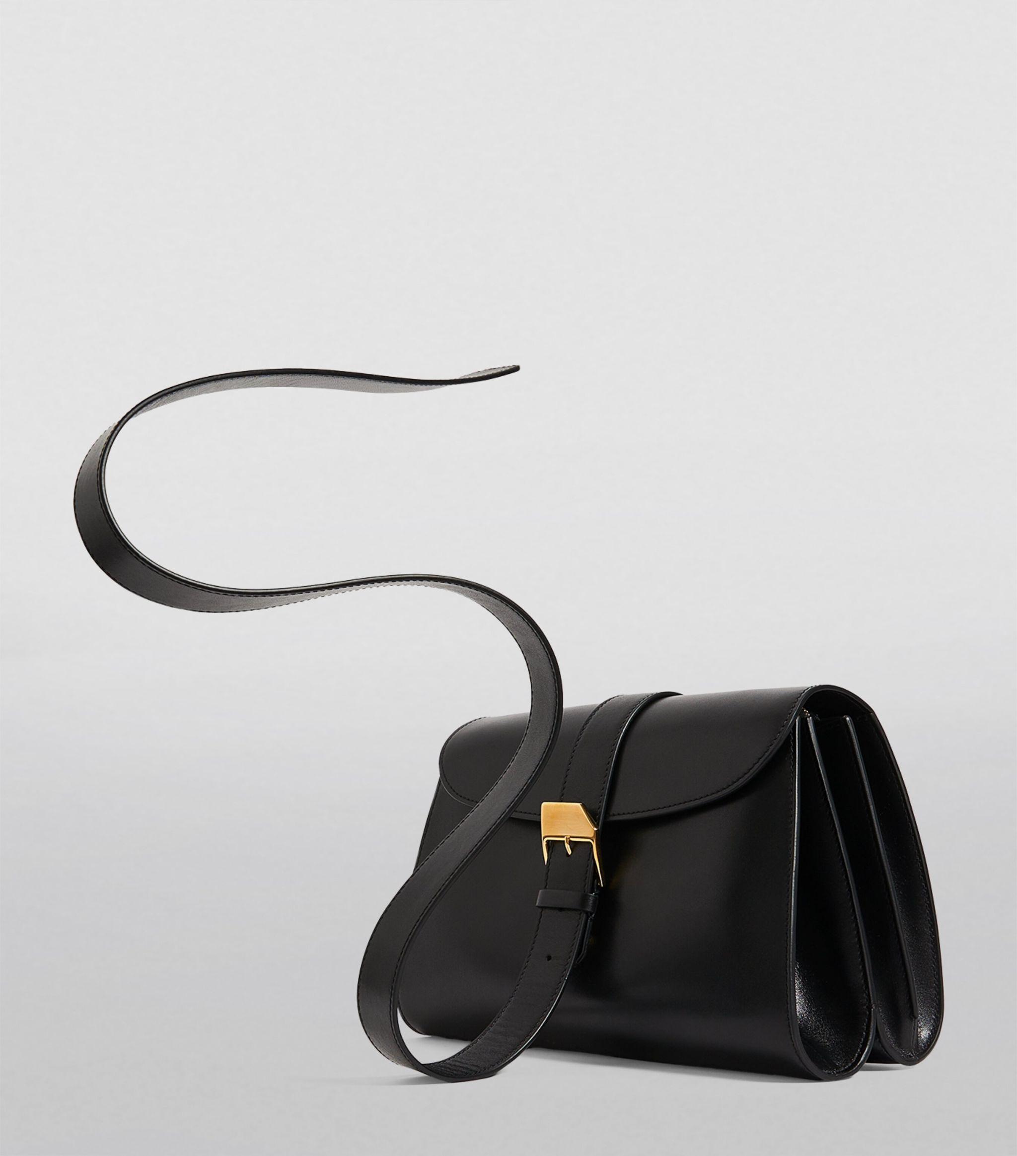 The Row Leather Isla Clutch Bag in Black | Lyst Canada