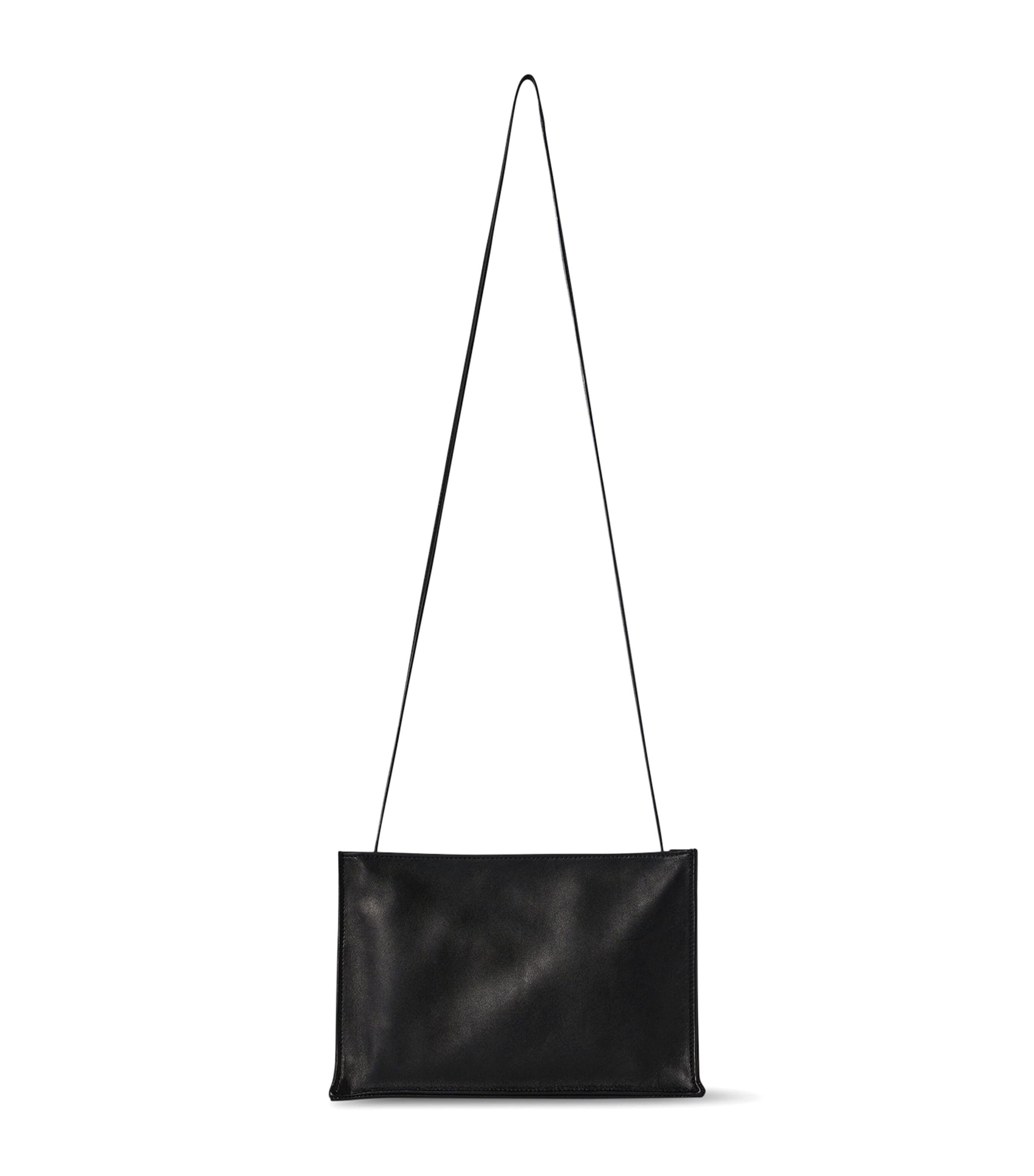 The Row To Go Large Leather Cross-Body Bag in Black | Lyst