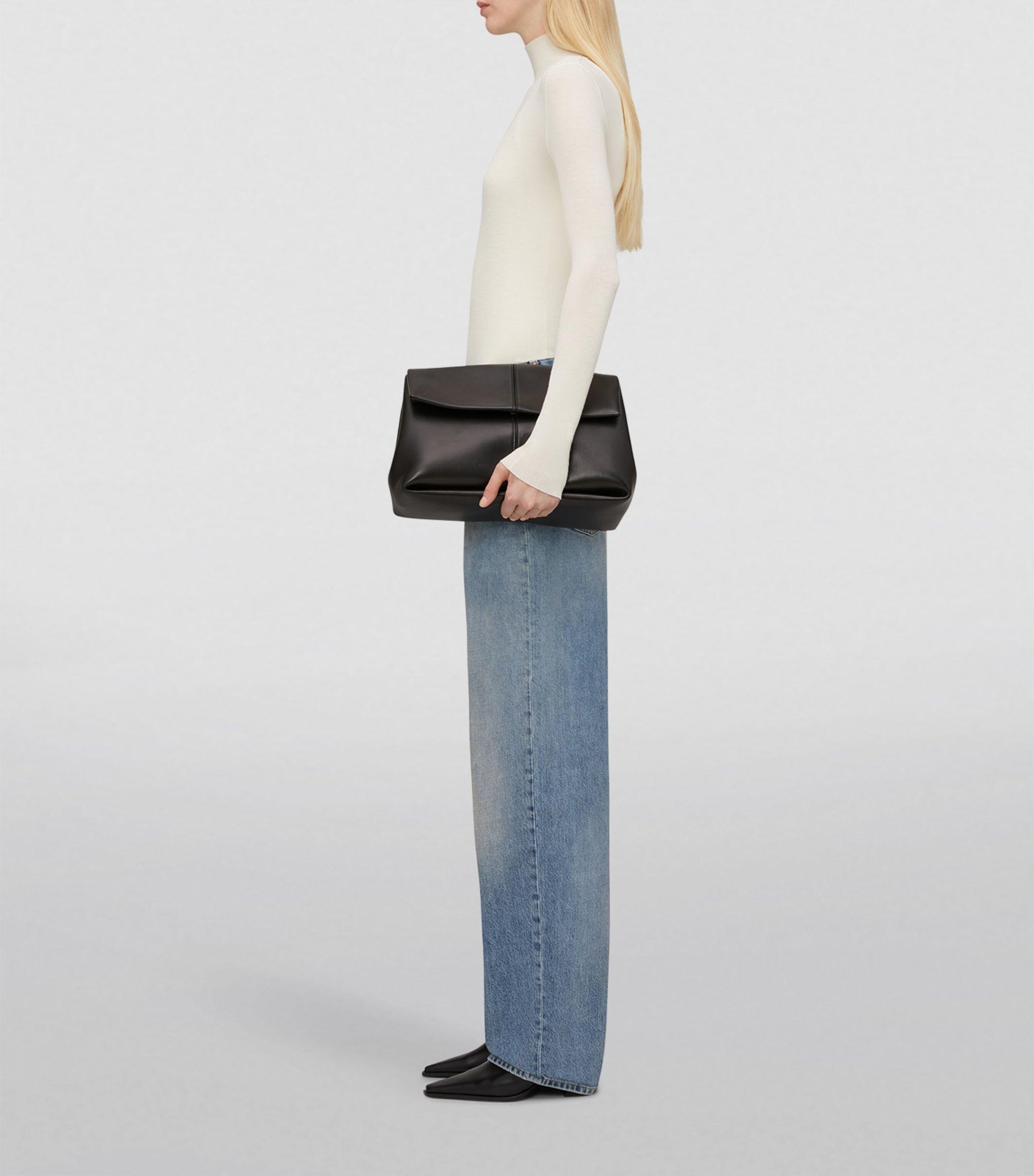 Bottega Veneta Leather Falcon Clutch Bag in Black | Lyst UK