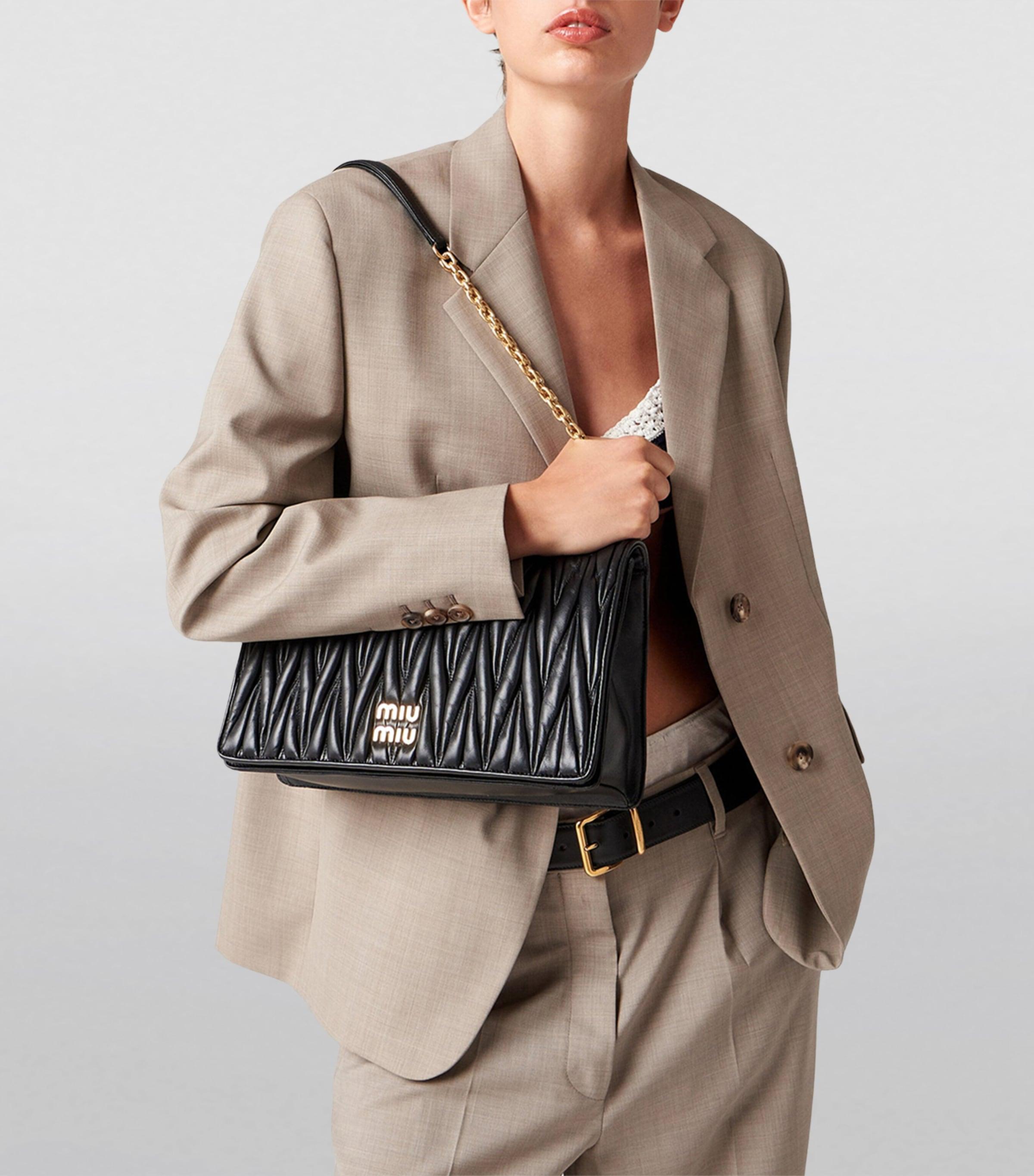 Miu confidential matelassé leather bag best sale