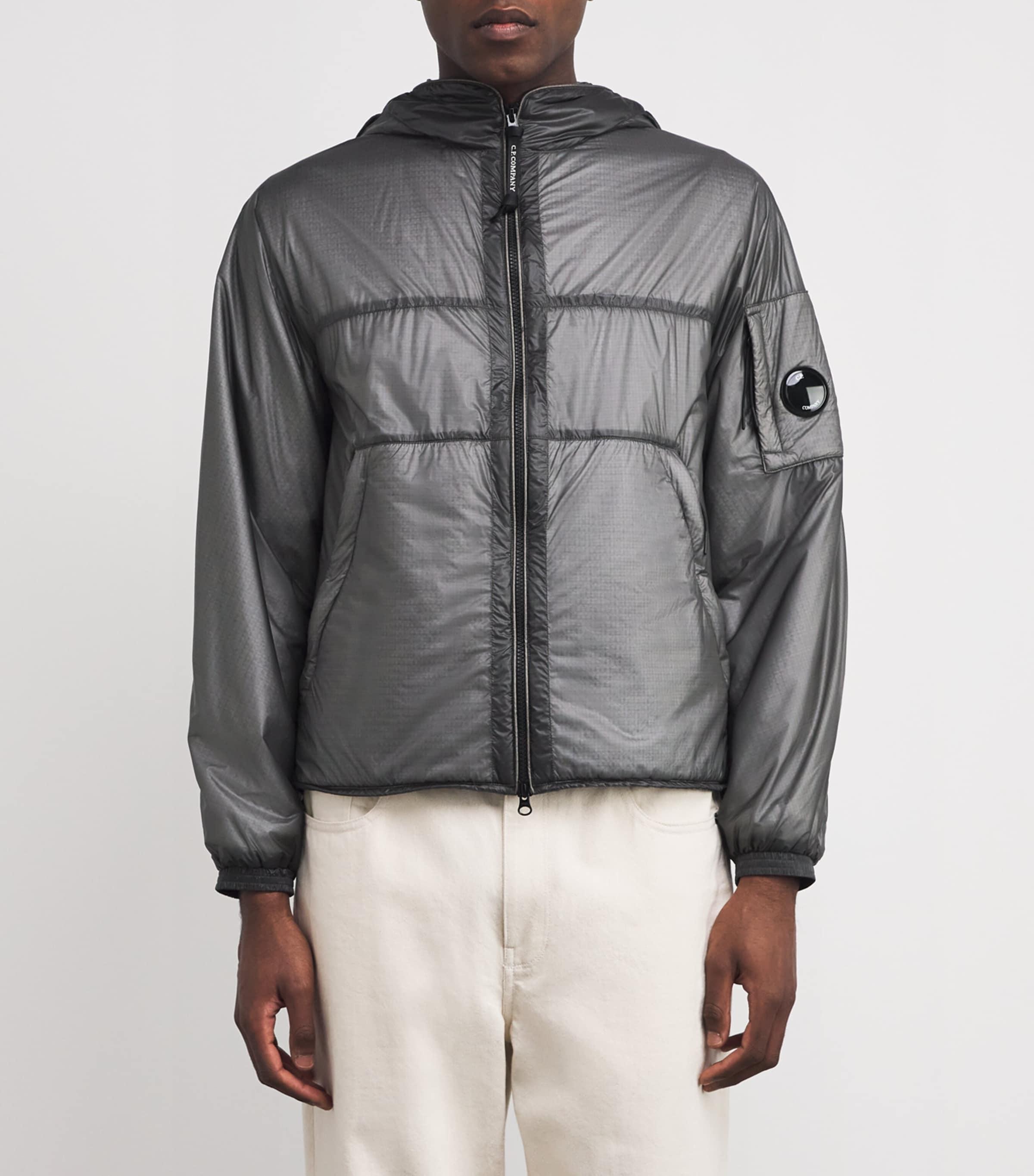 C.P. COMPANY faded puffer jacket brown