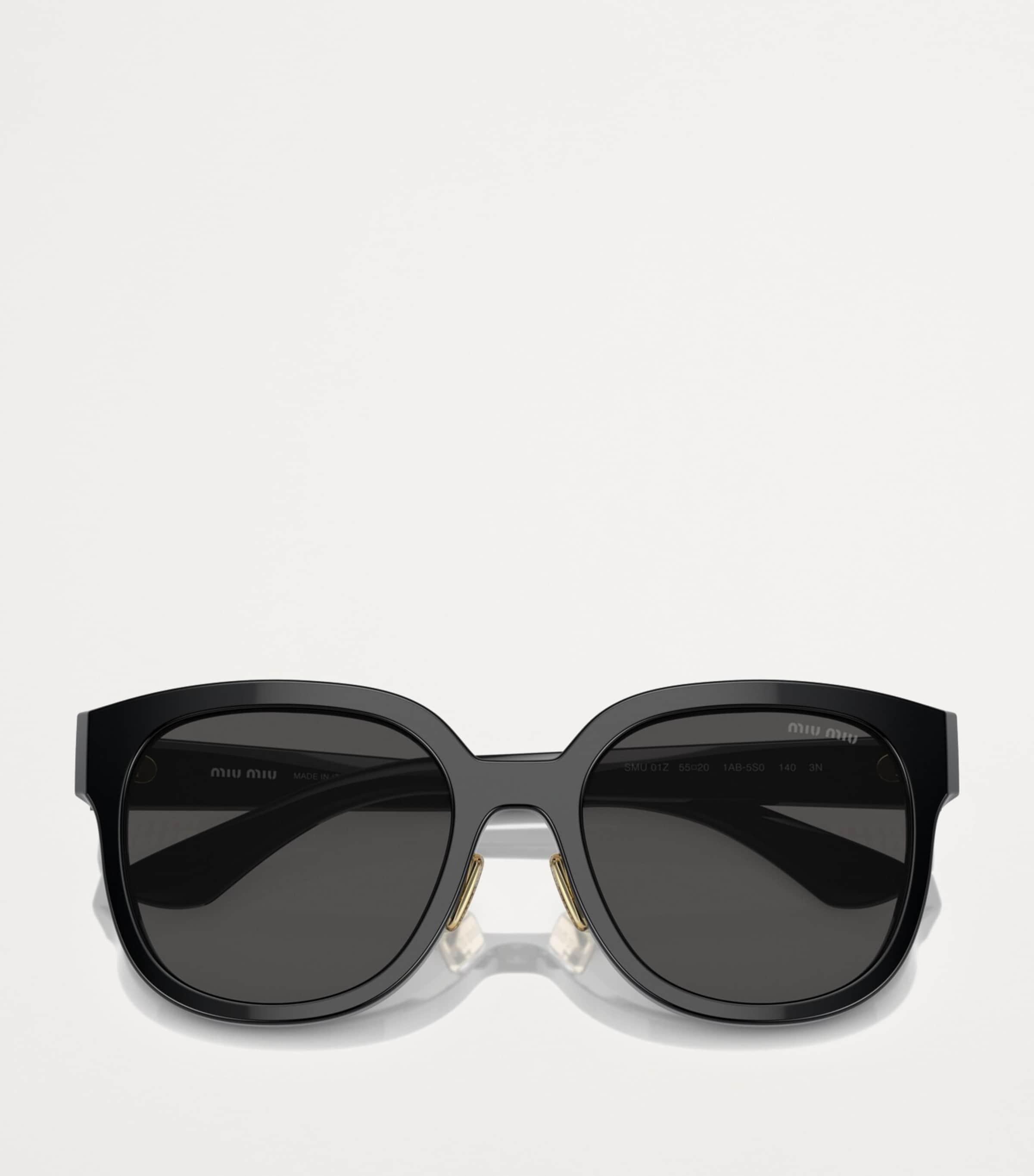 Miu Miu Acetate Round Sunglasses in Black Lyst UK