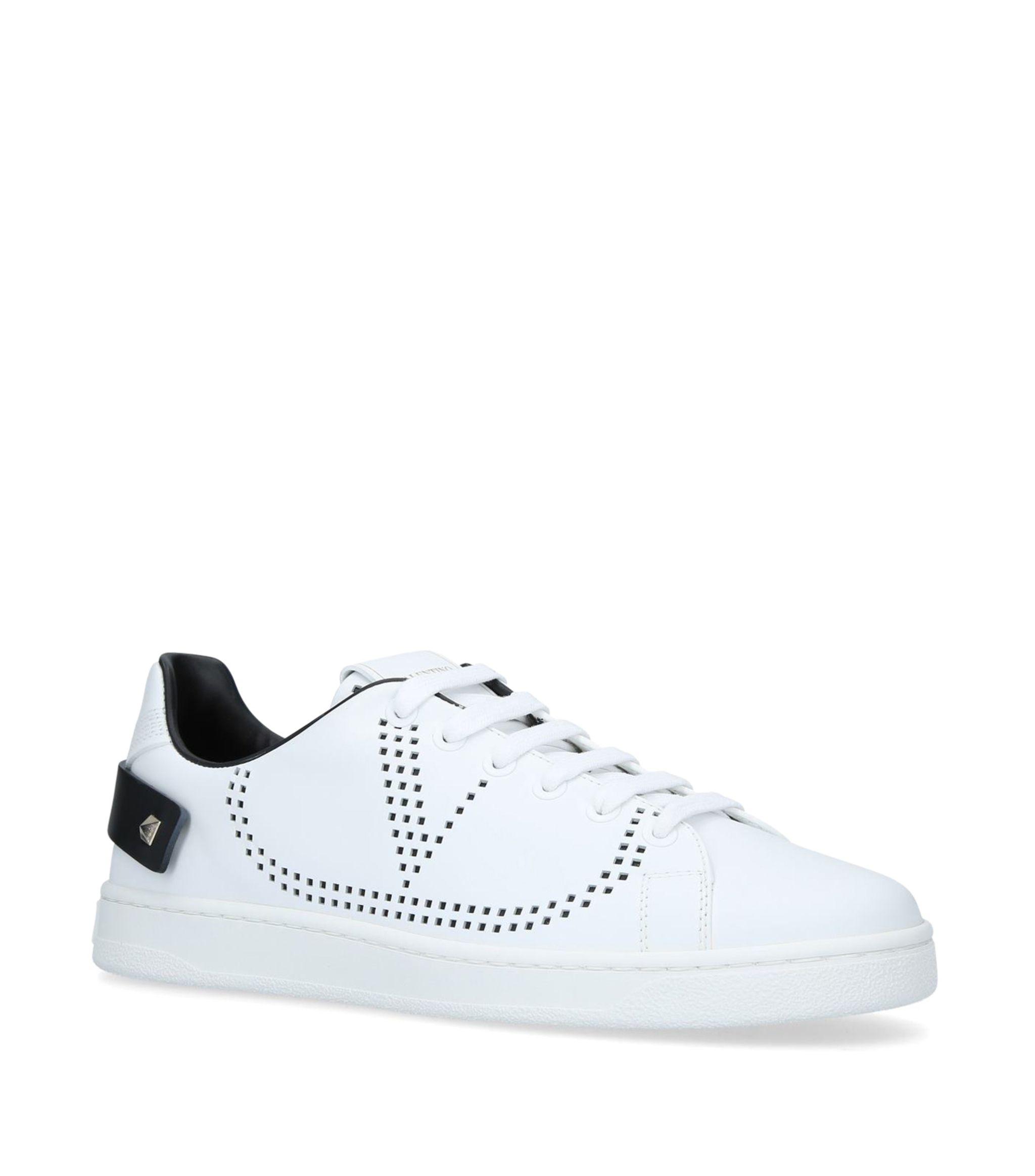 Valentino Garavani Vlogo Backnet Leather Sneaker in White - Save 49% - Lyst