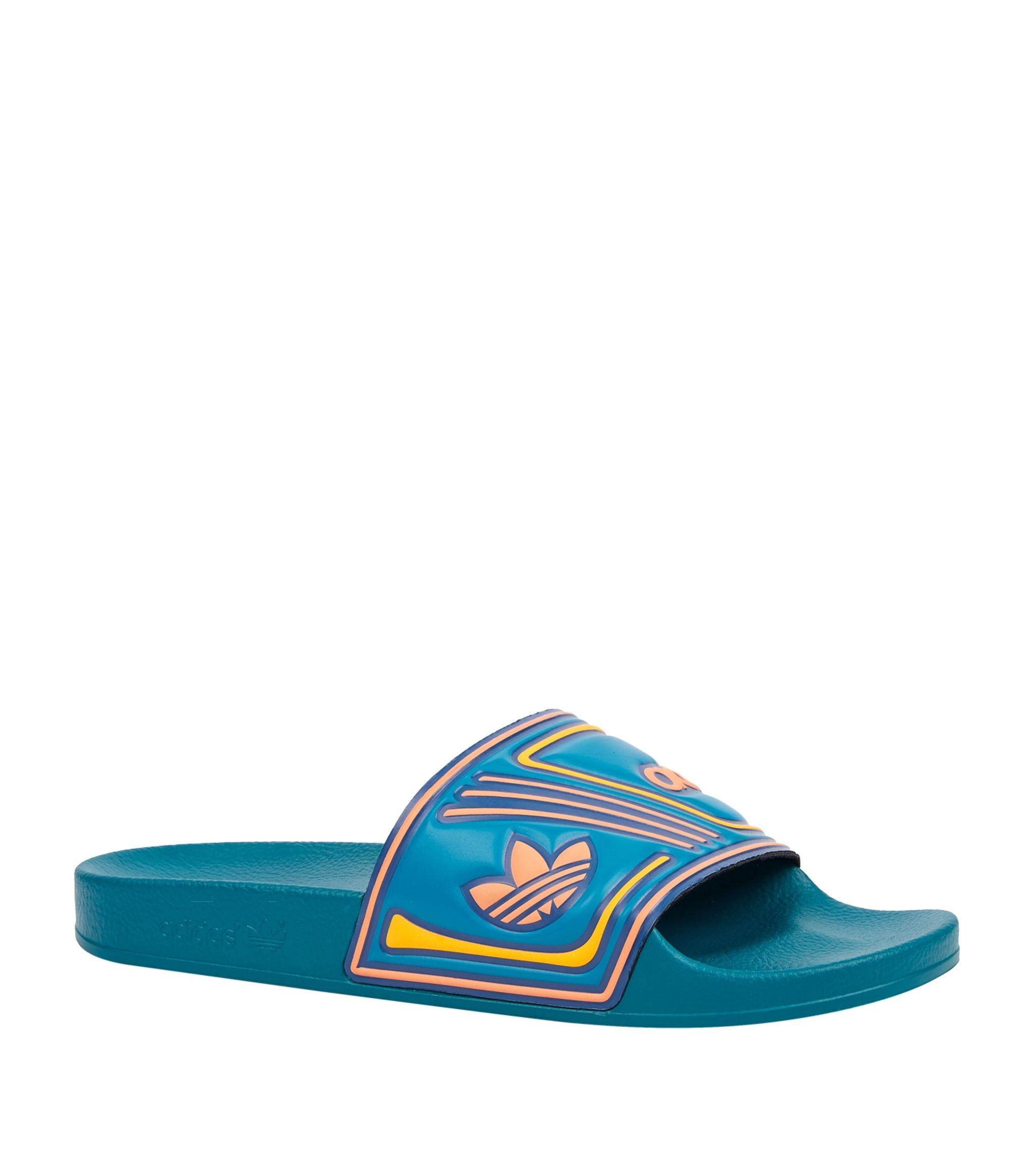 turquoise adidas slides