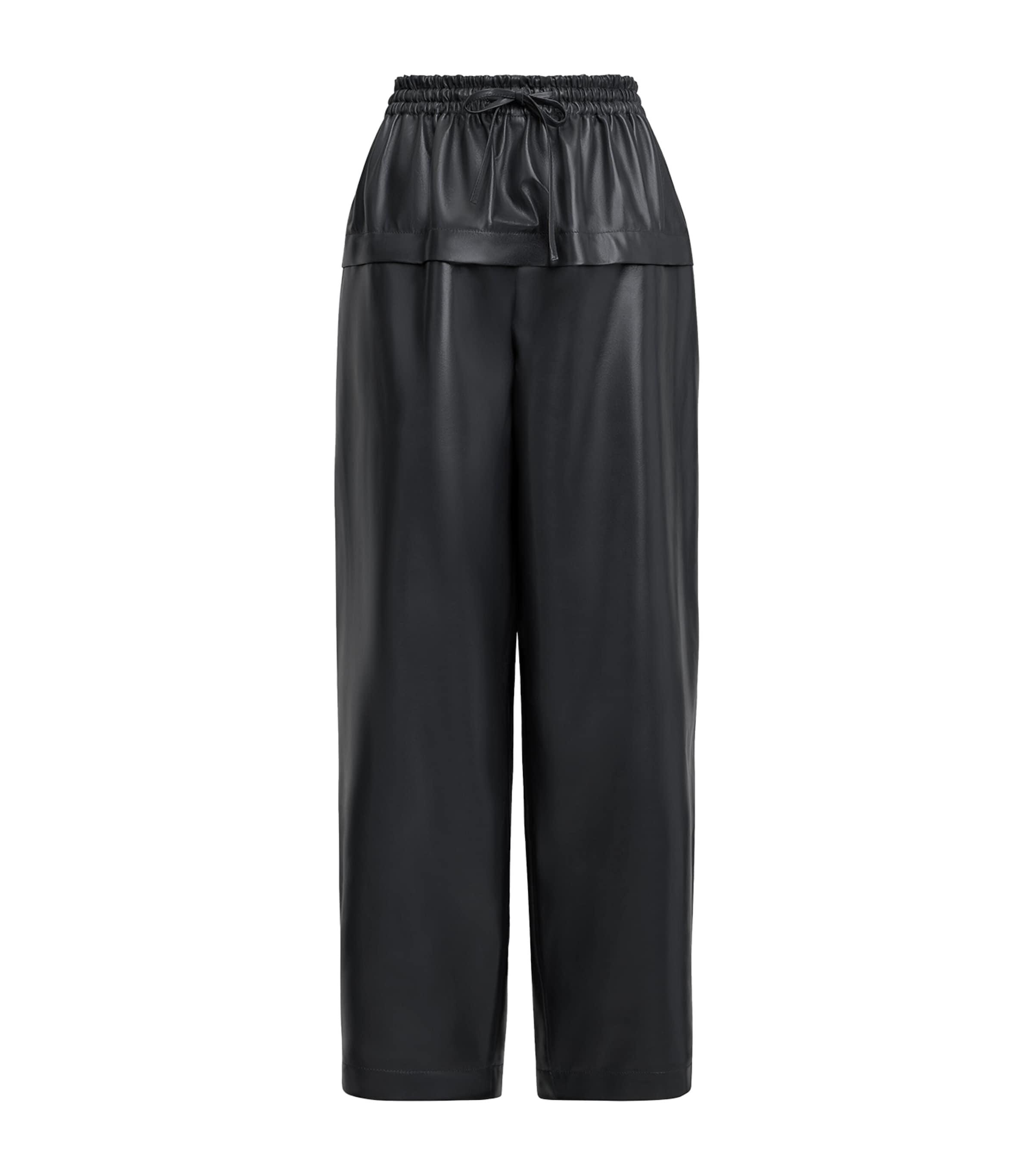 パンツ ALAIA LIGHT GREY PEPLUM TROUSERS Alaïa Light grey Peplum trousers | TheDoubleF