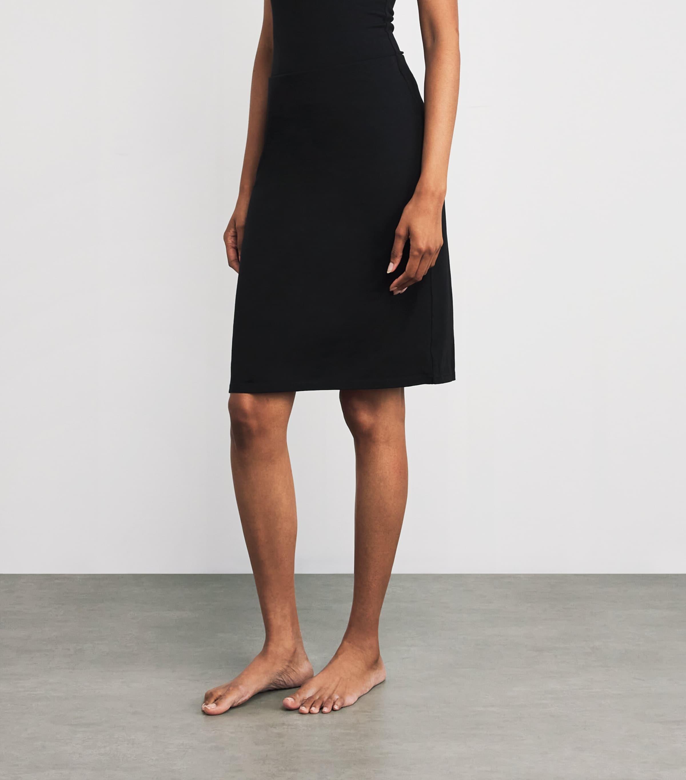 Skims Smooth Layers Midi Skirt in Black | Lyst