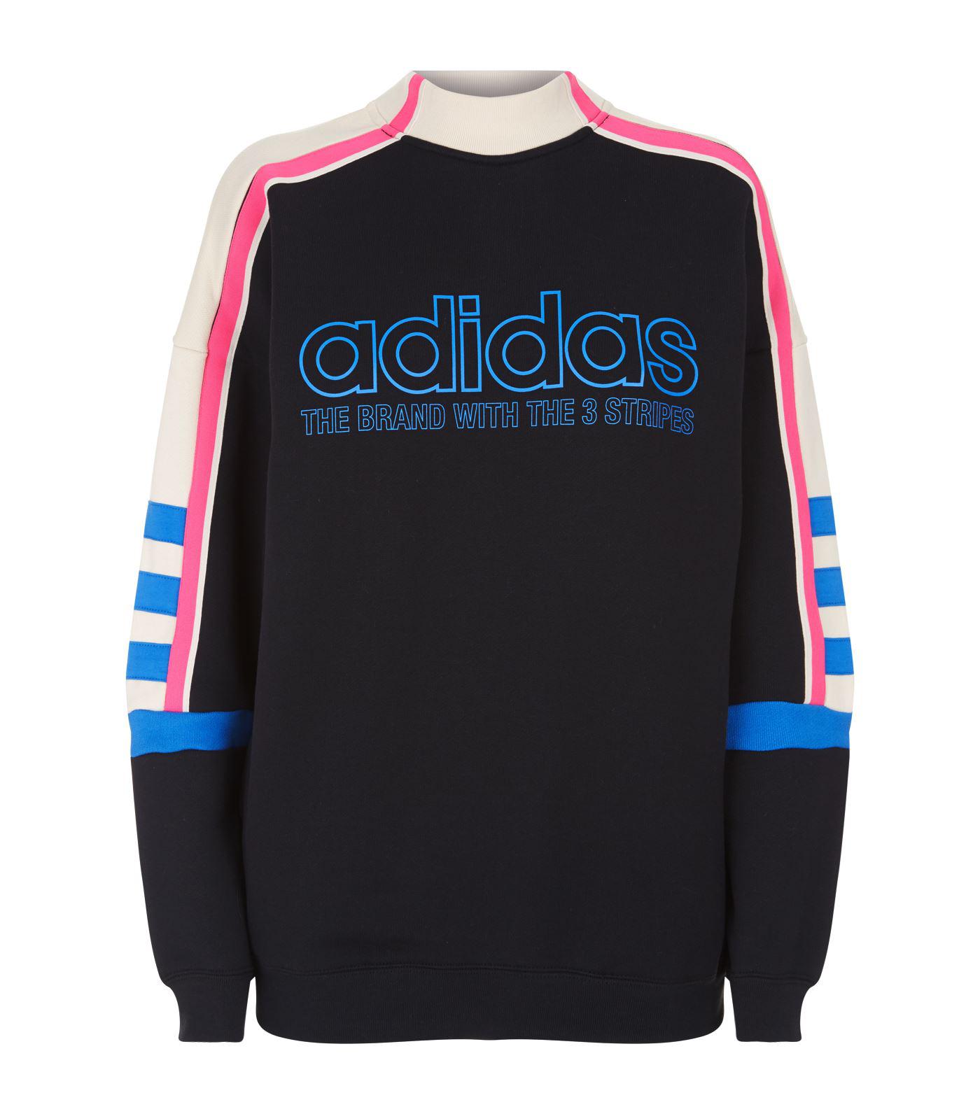 adidas the brand with the 3 stripes sweater