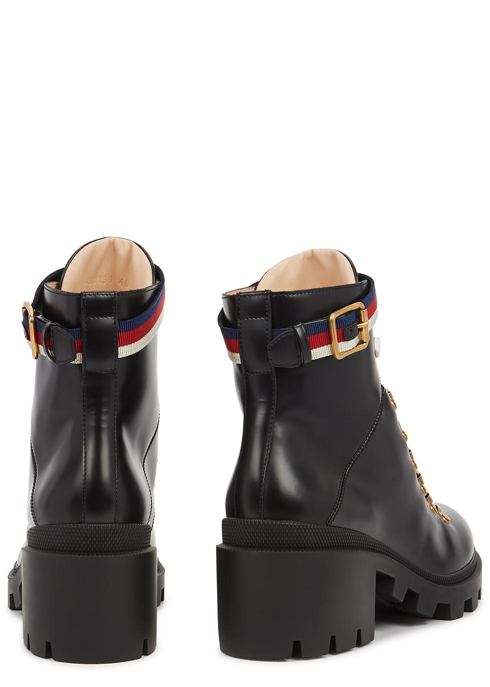 gucci boots with snakes on the bottom