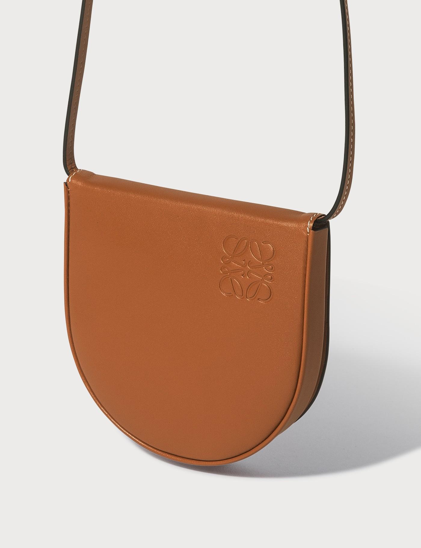 small heel pouch in soft calfskin