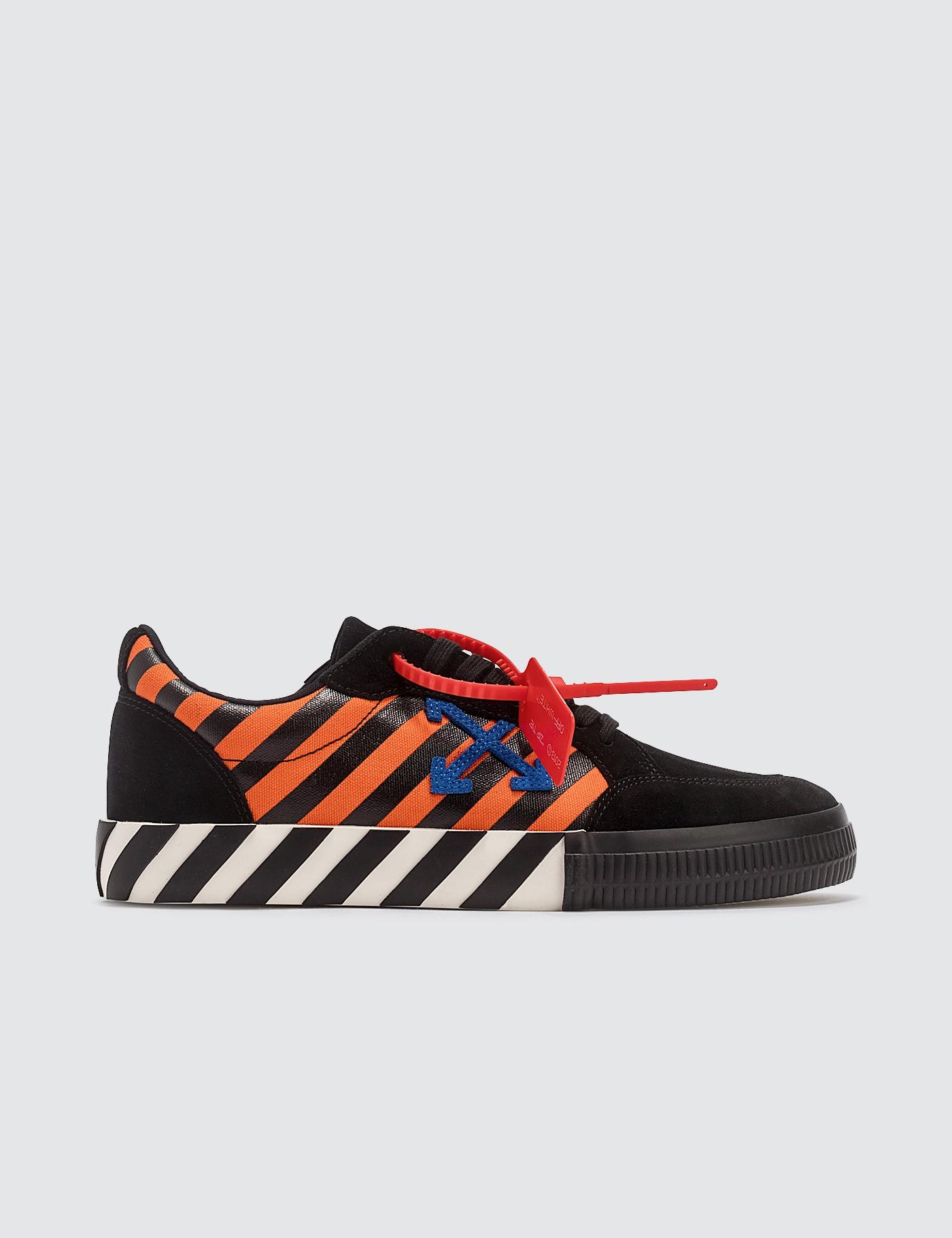off white blue and orange sneakers