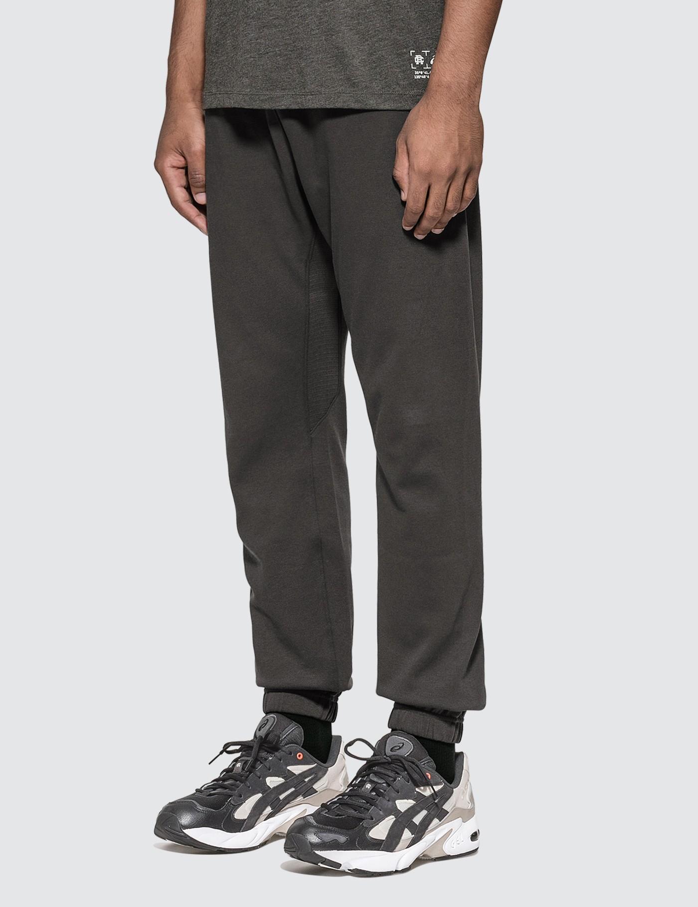 asics reigning champ pants