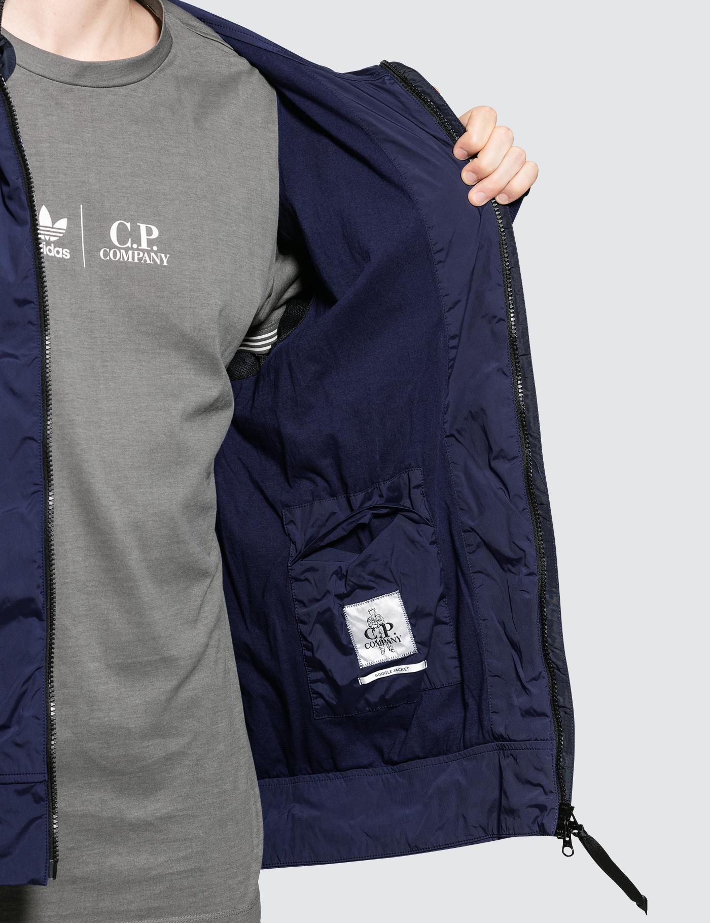 cp company adidas track top