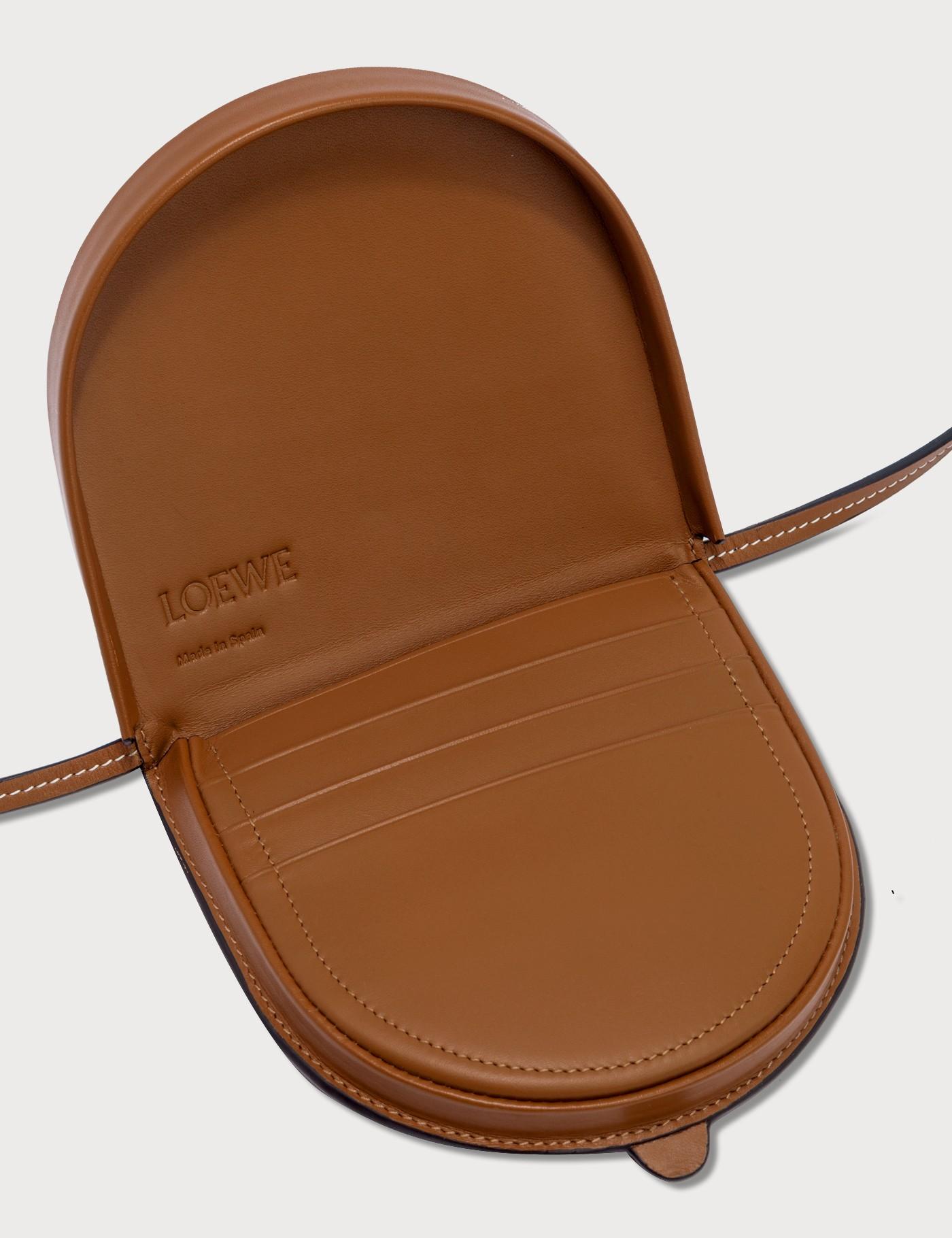 small heel pouch in soft calfskin