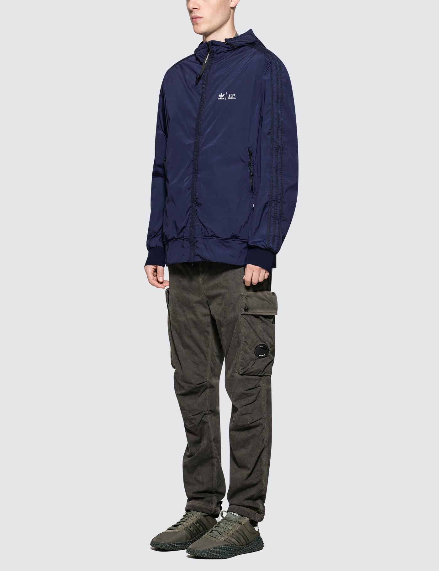 cp company adidas track top