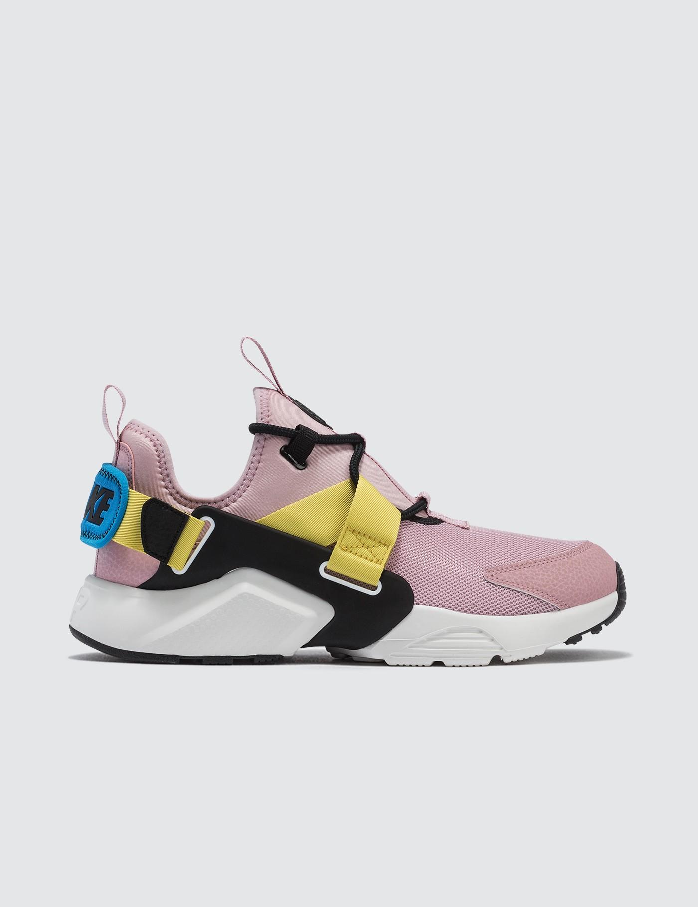 nike air huarache city low pink