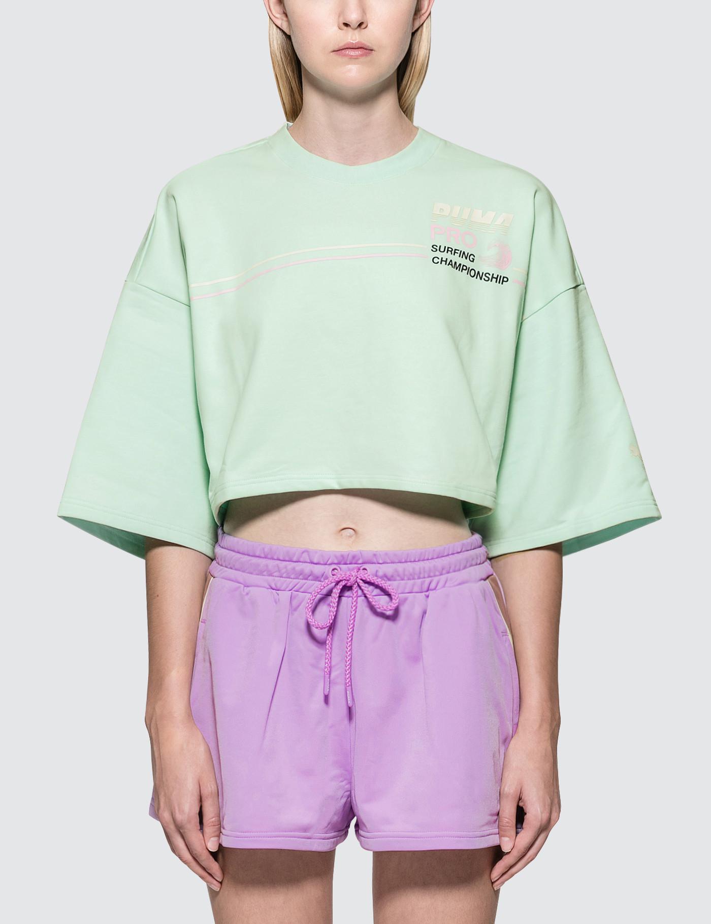 mint green puma shirt