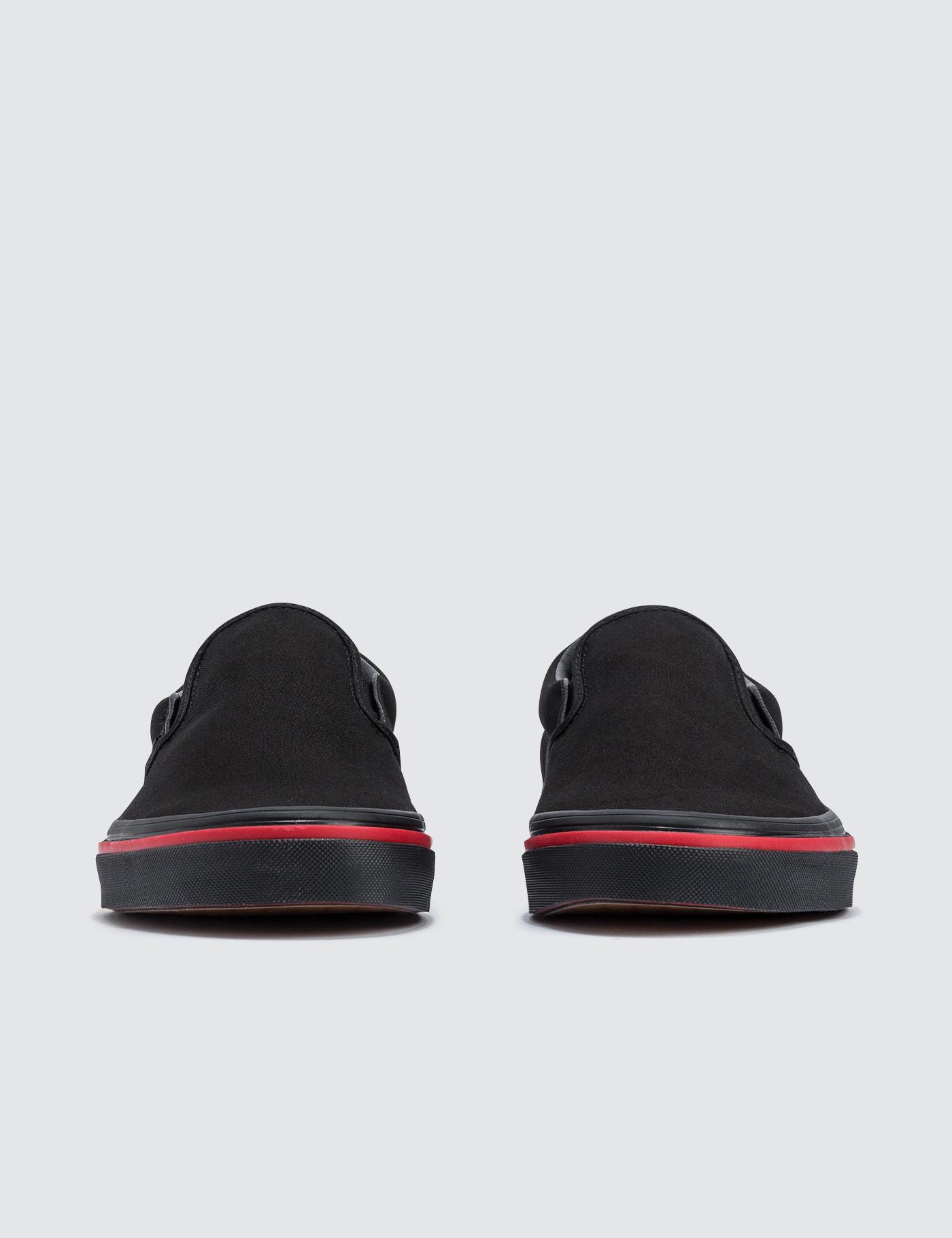 vans slip on flame wall