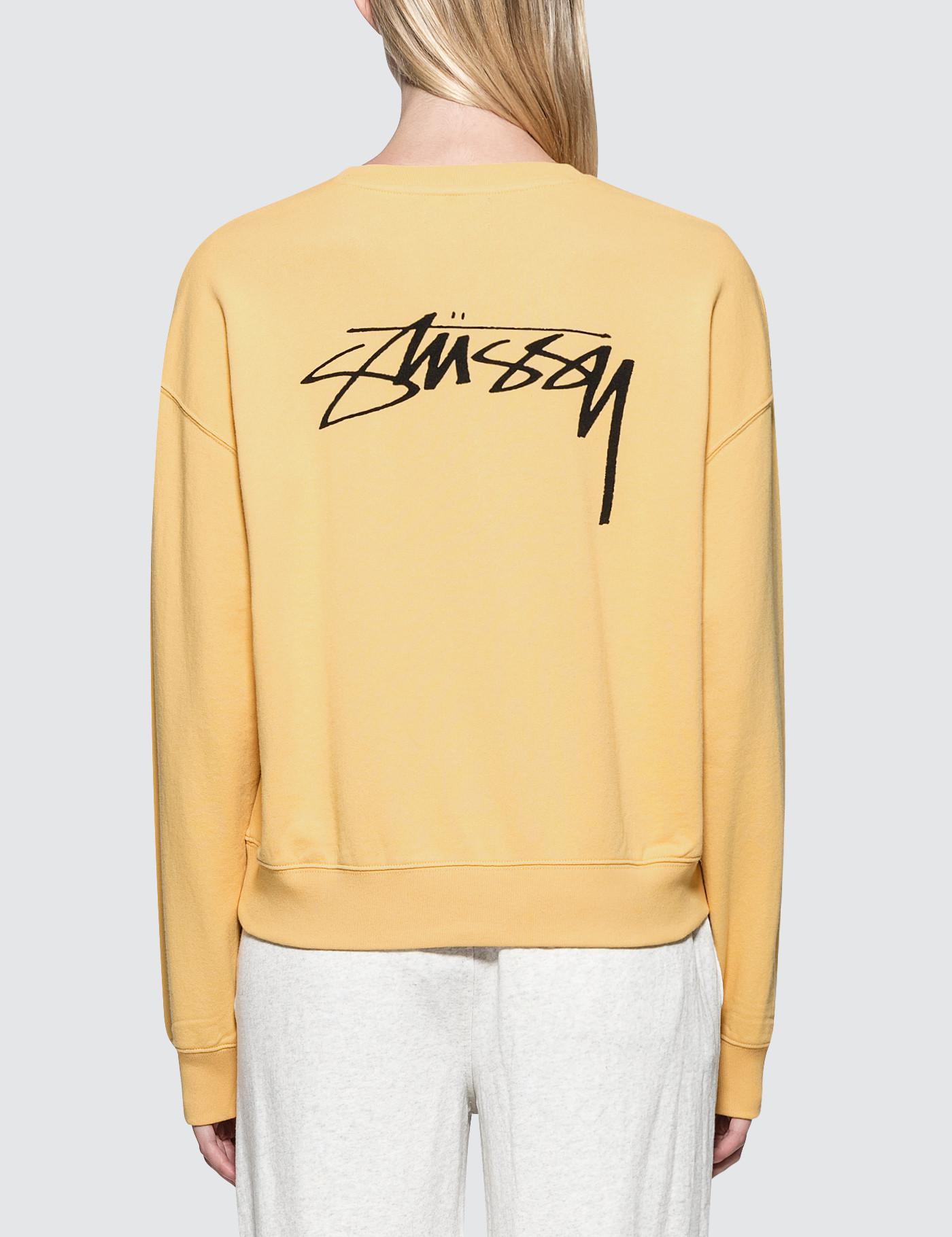 baggy yellow sweatshirt