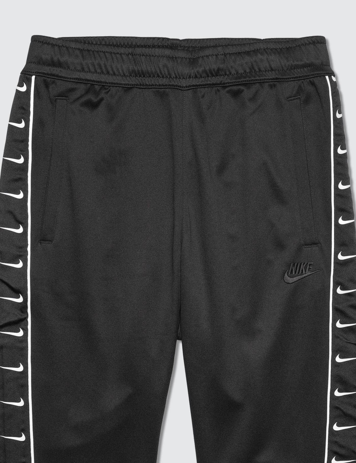 Nike Synthetic Side Swoosh Logo Track Pants in Black for Men - Lyst