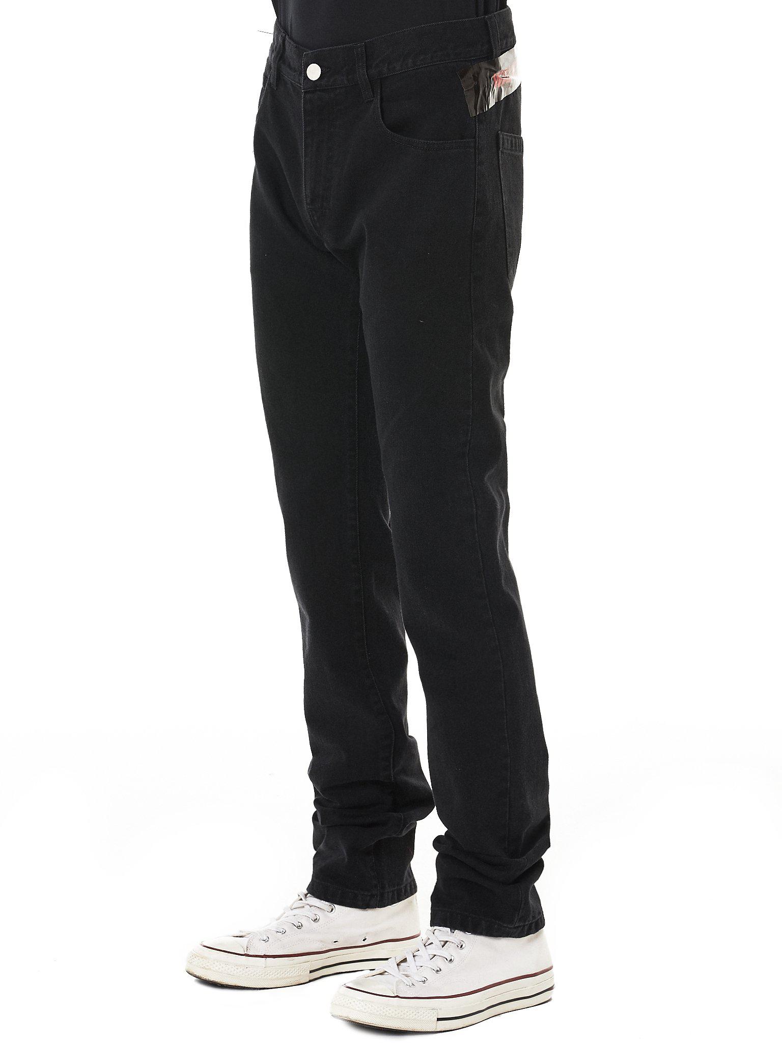 raf simons tape jeans