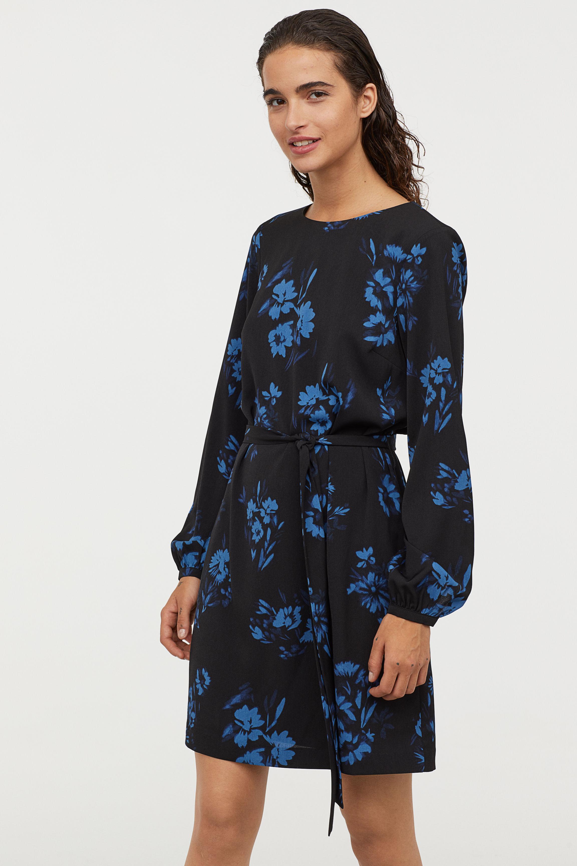 black dress blue flowers