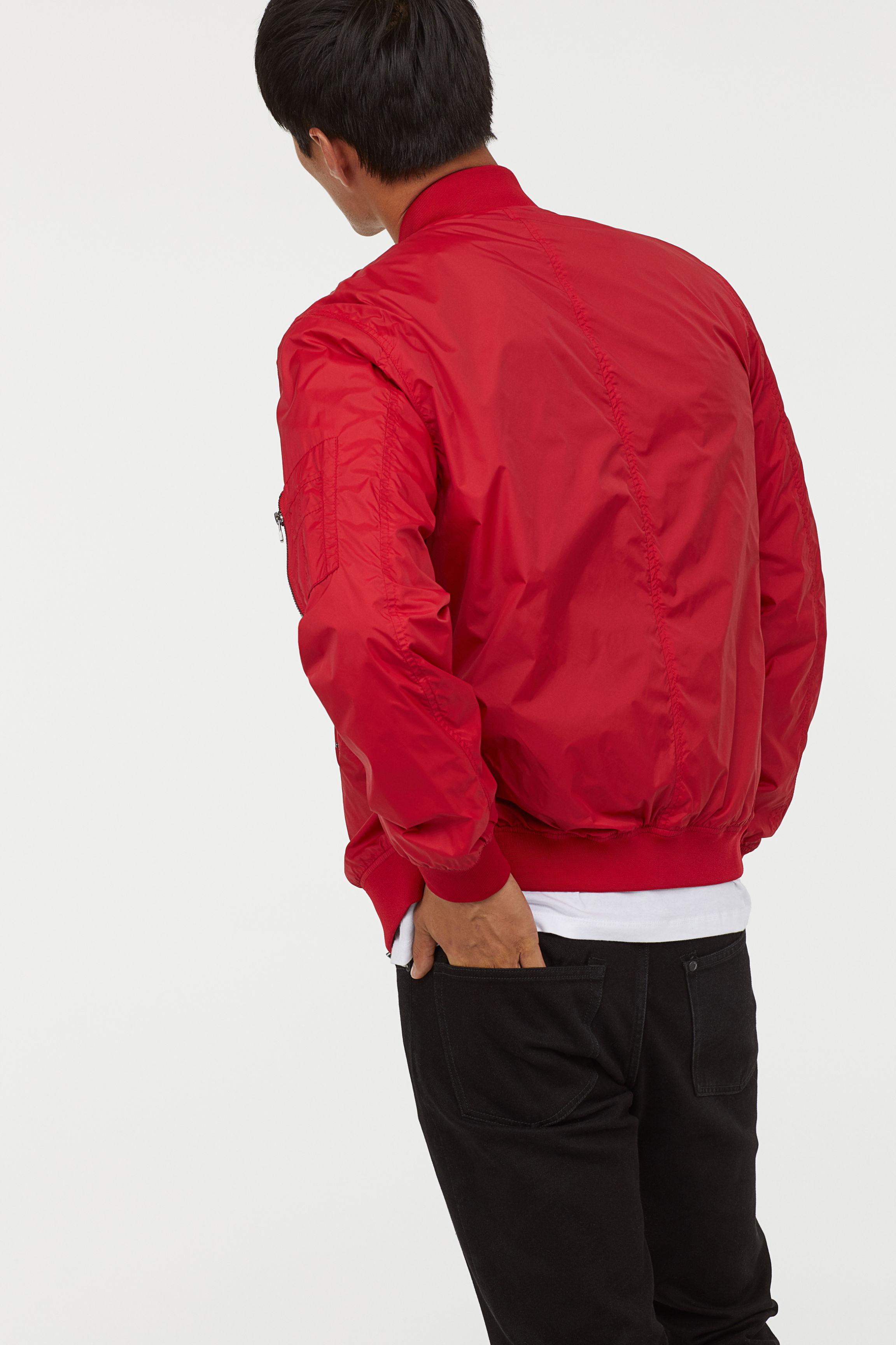 red nylon bomber jacket
