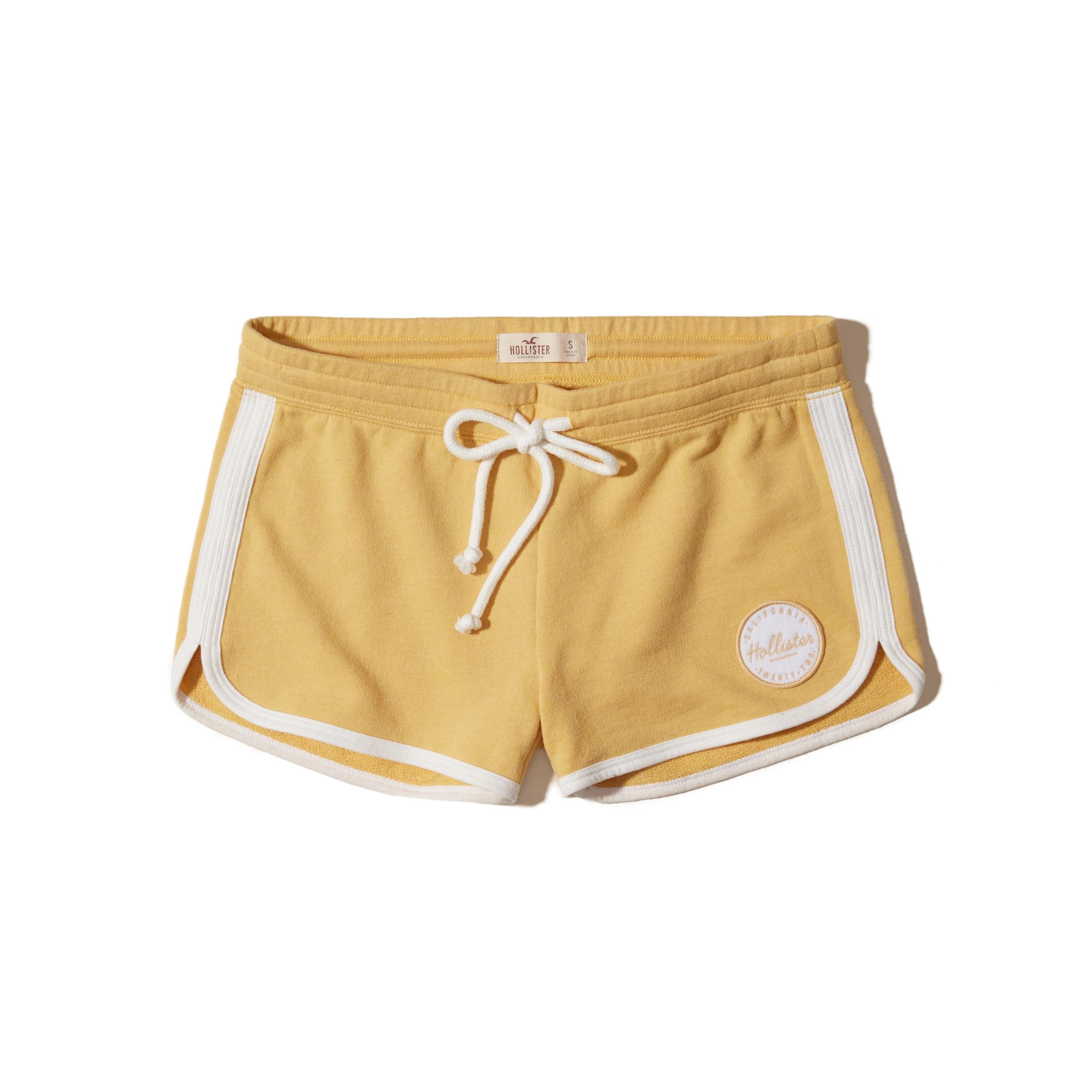 Lyst Hollister Curved Hem Logo Shorts in Yellow