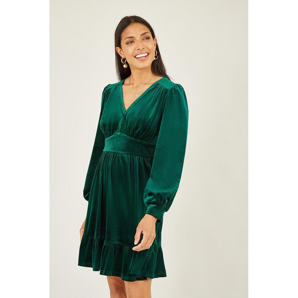 dark green velvet skater dress Mela London Long Sleeve in formal green velvet dress