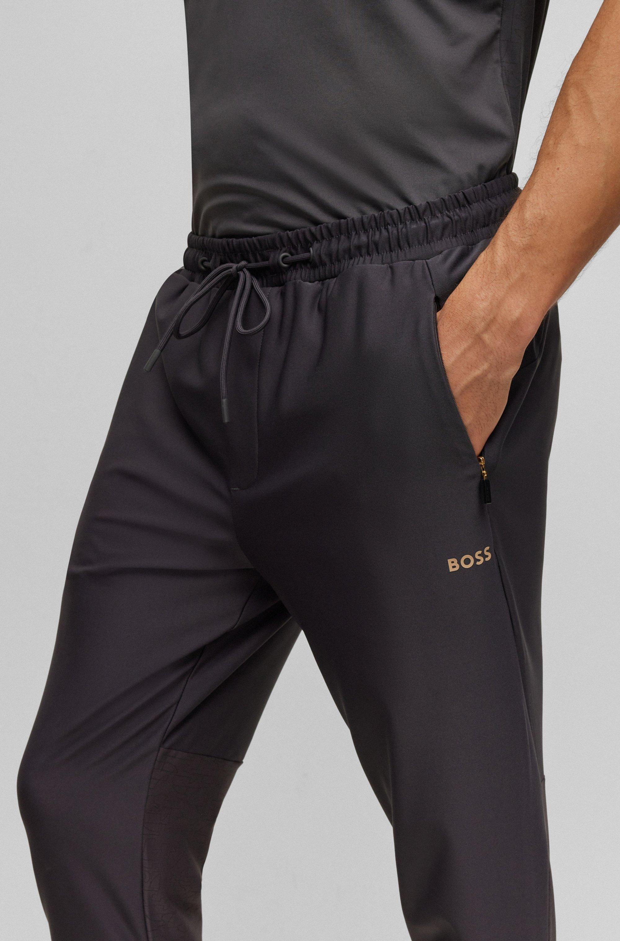 BOSS by HUGO BOSS Regular-fit Tracksuit Bottoms With Decorative Reflective  Pattern in Black for Men | Lyst