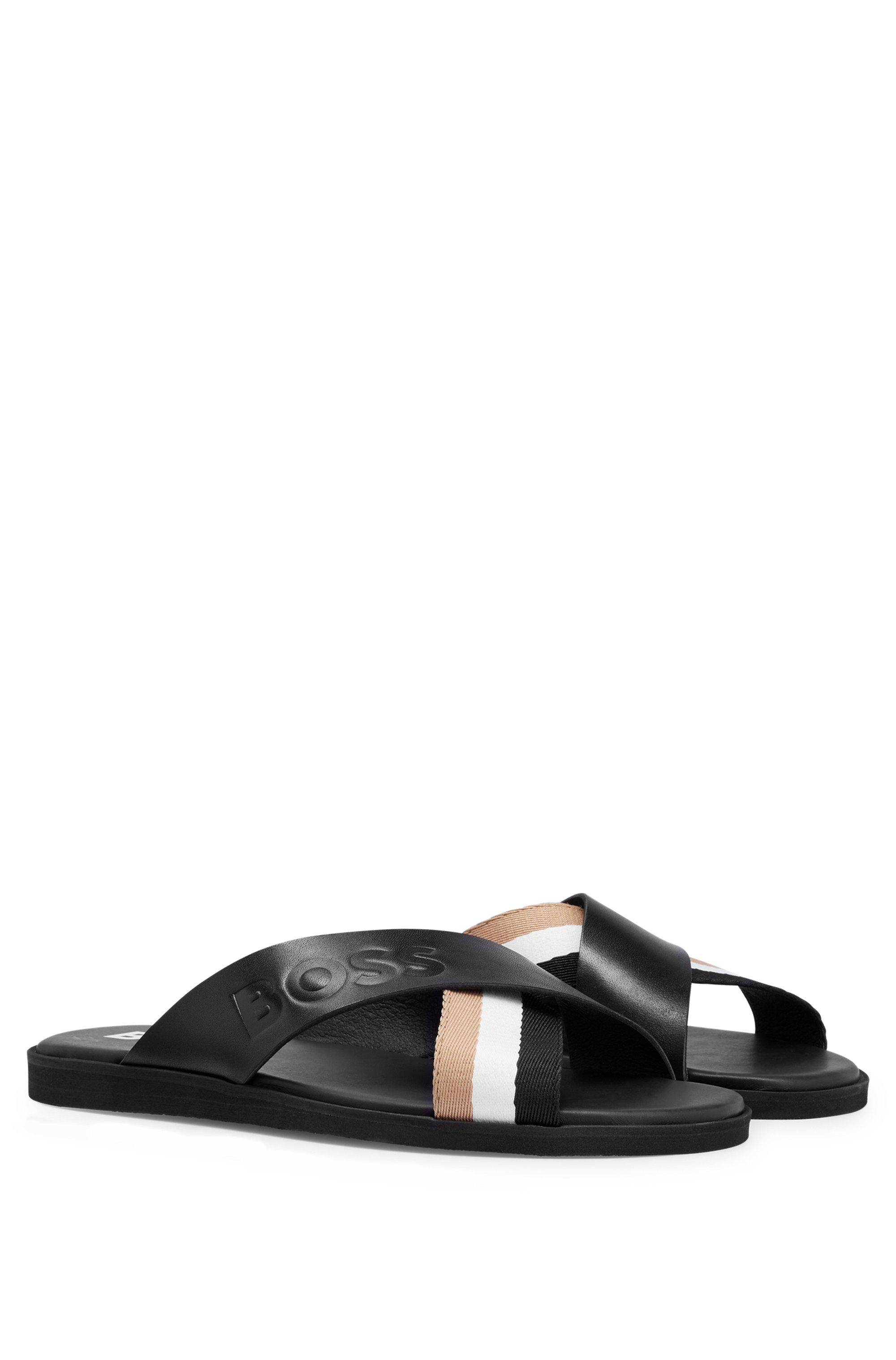 BOSS by HUGO BOSS Slides aus Leder mit SignatureStreifen und Logo in