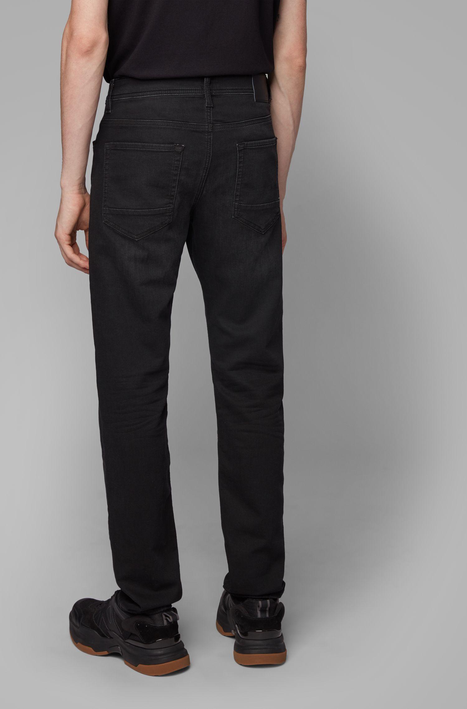 BOSS Tapered-fit Jeans In Black Coated Knitted Denim for Men - Lyst