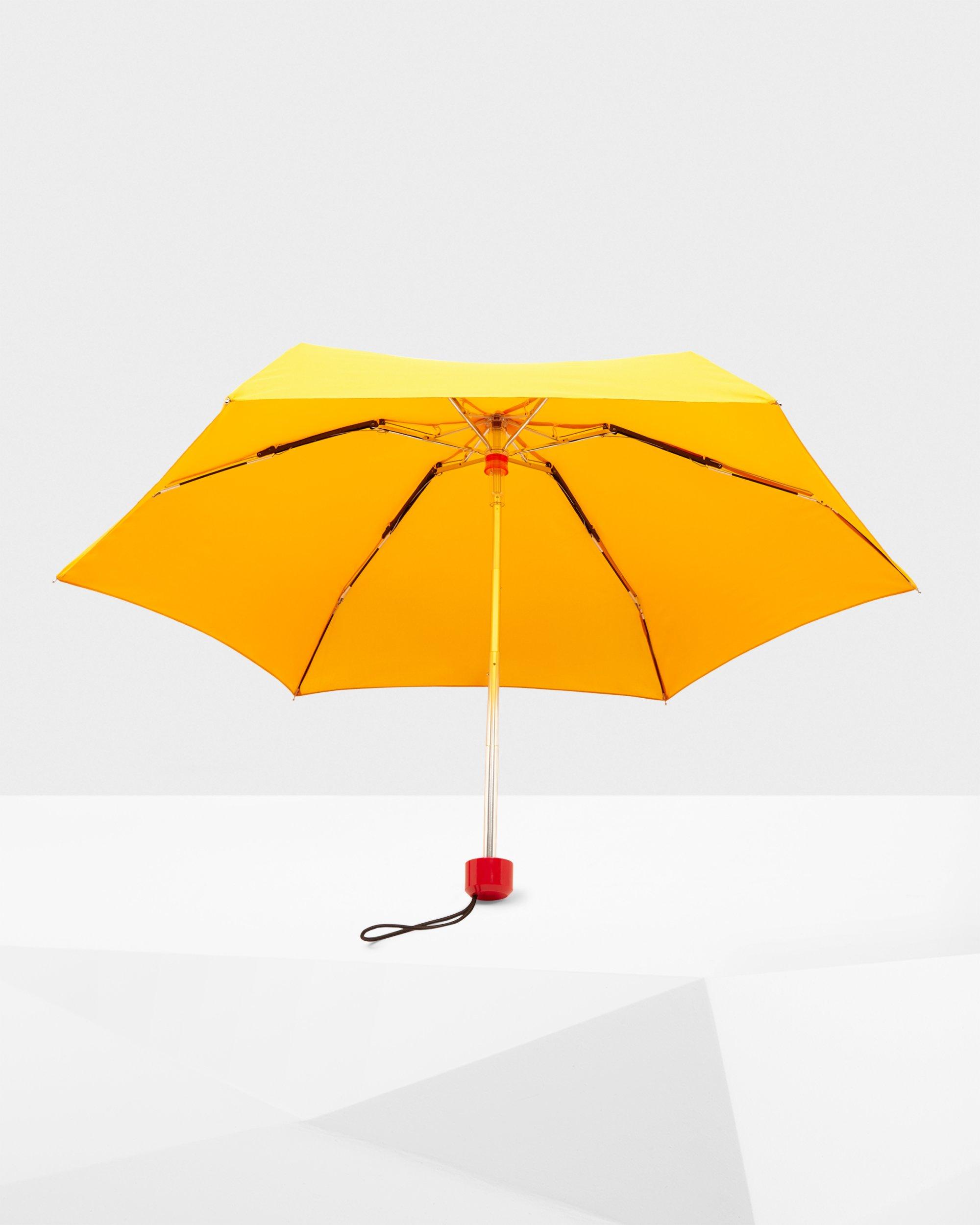 yellow compact umbrella