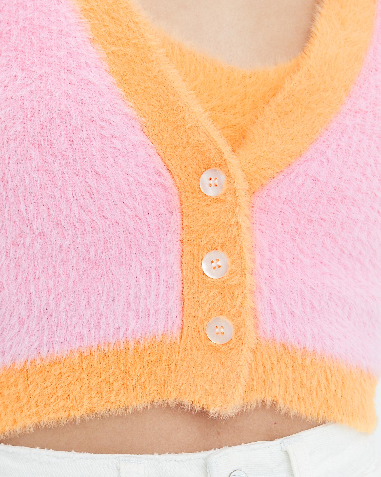 orange and pink cardigan