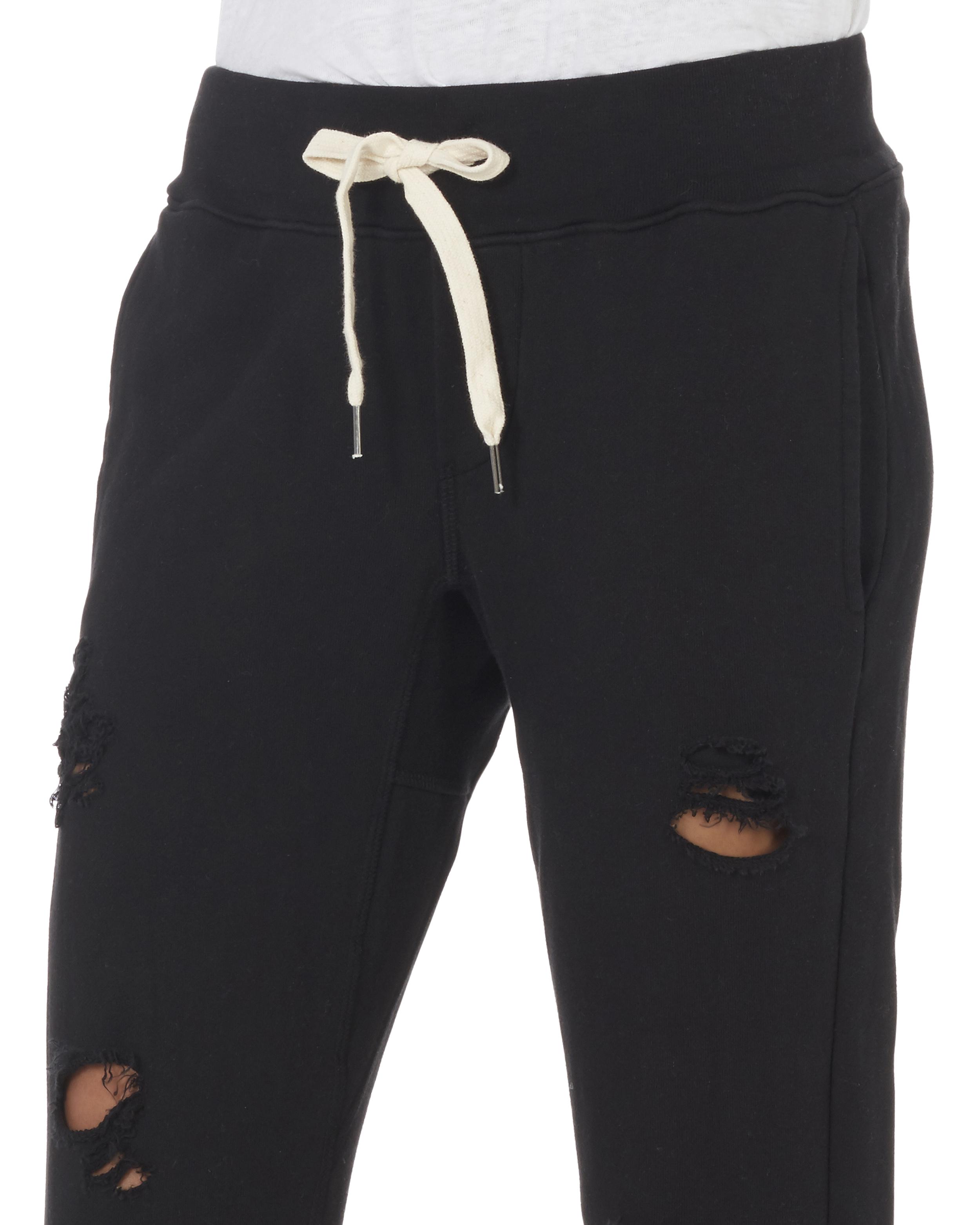 black ripped sweatpants