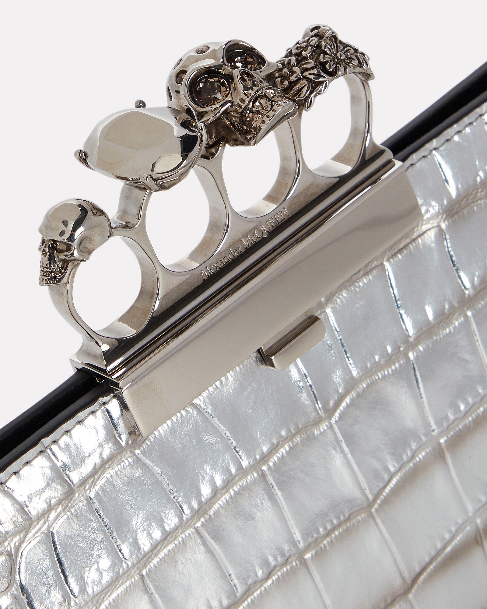 Alexander McQueen Skull Four Ring Embossed Clutch in Silver (Metallic