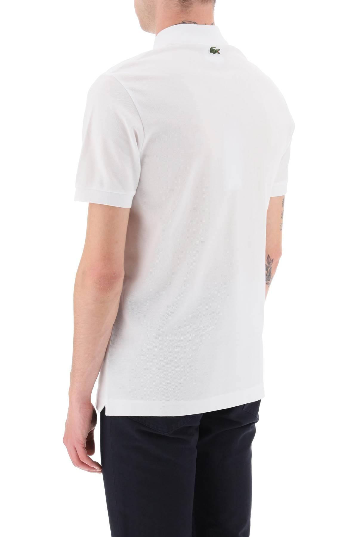 Lacoste X Netflix Short Sleeved Polo T Shirt in White for Men | Lyst