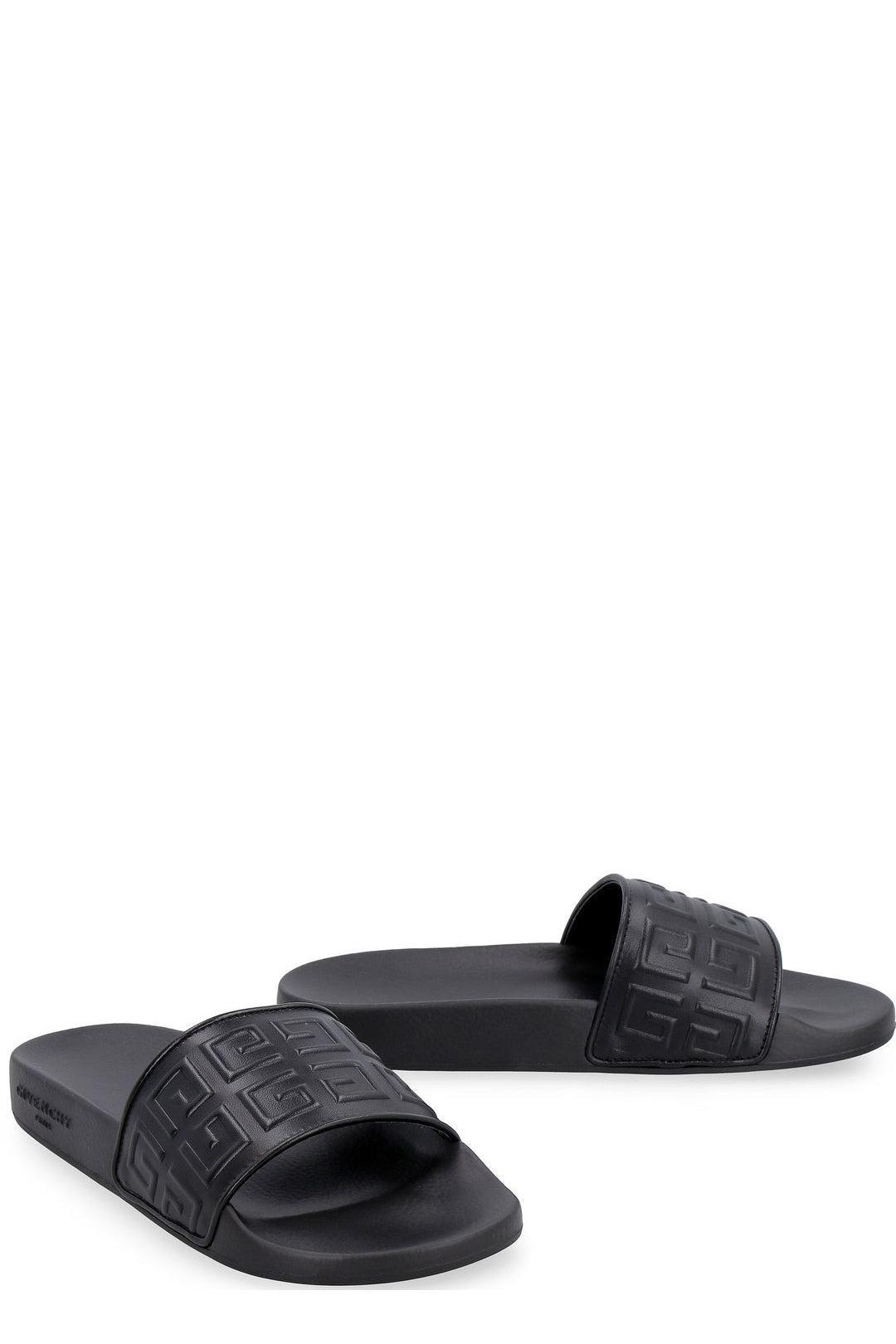 Givenchy 4g Logo Embossed Slip-on Sandals in Black | Lyst