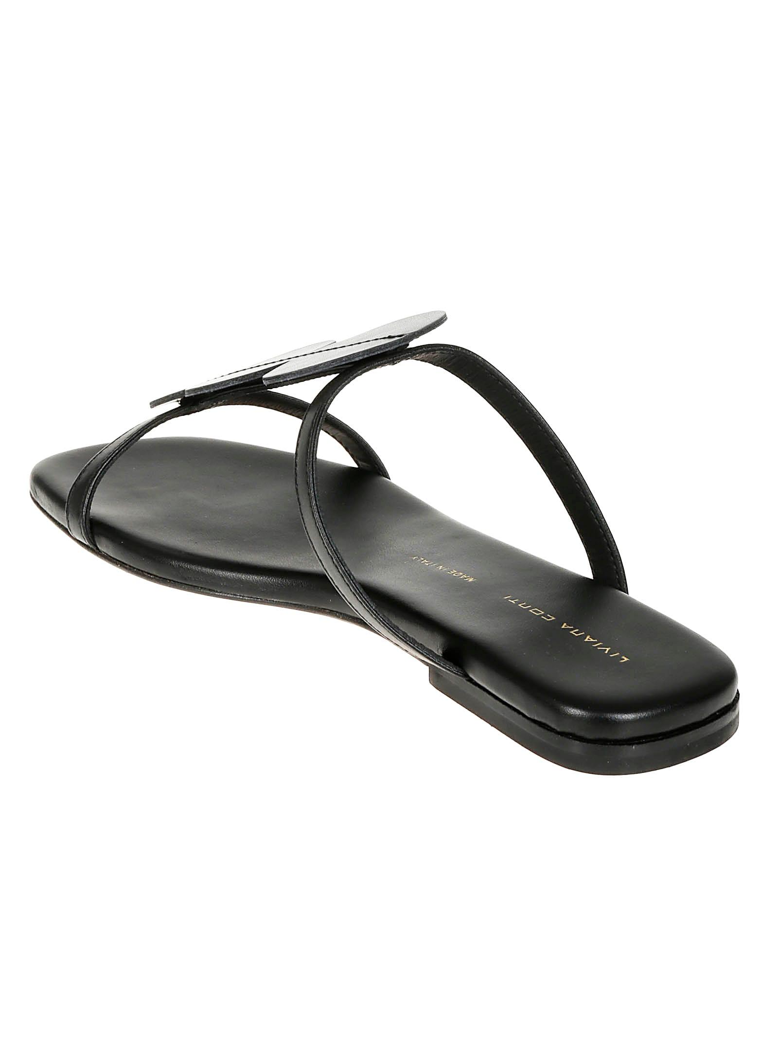 Liviana Conti Flat Mules Dots in Black | Lyst