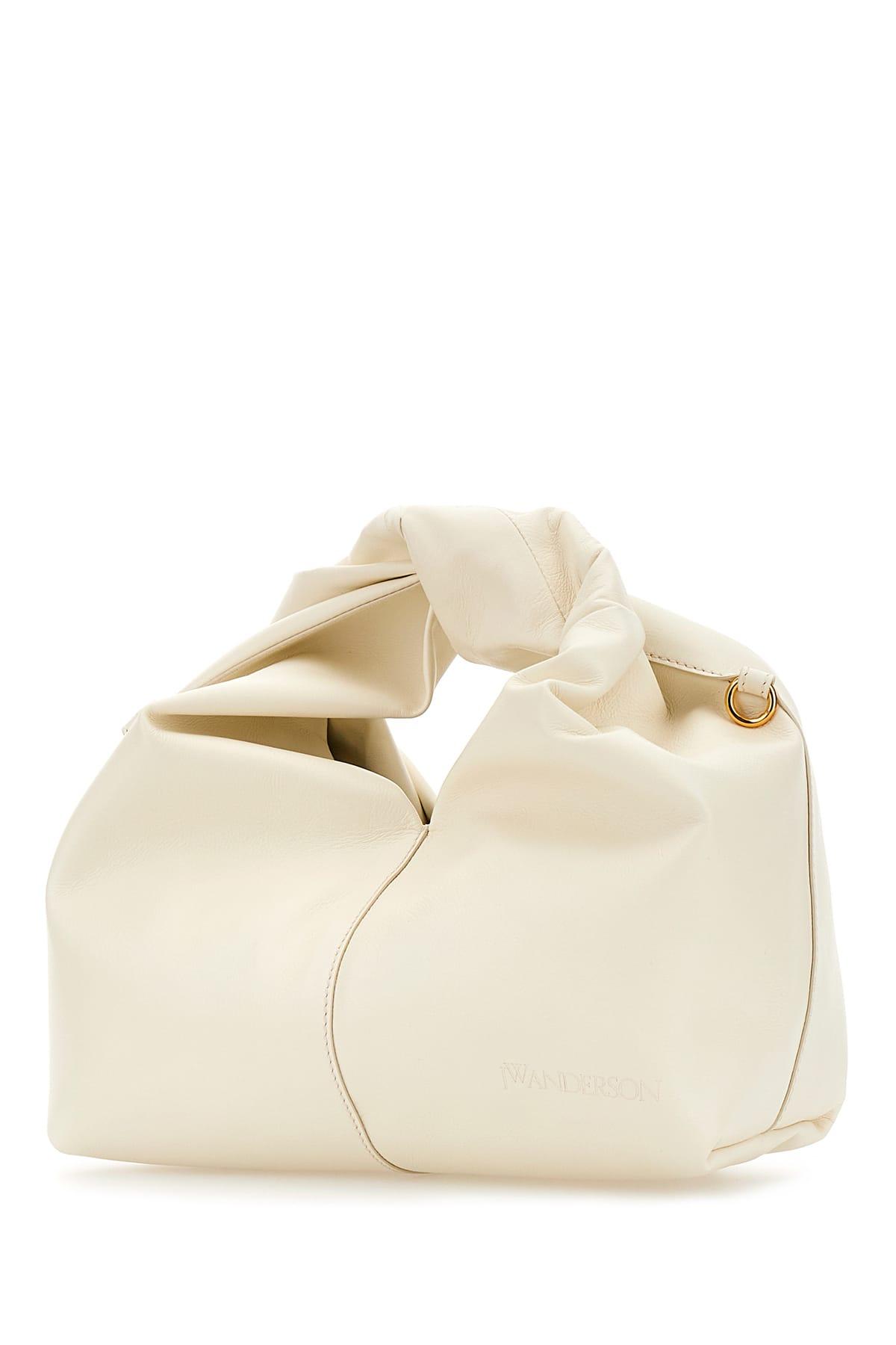 トートバッグ J W ANDERSON Ivory leather mini Twister Hobo handbag JW Anderson Ivory Leather Mini Twister Hobo Bag – LOZURI®
