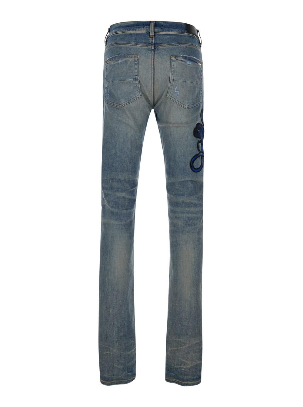 amiri--Light-Skinny-Jeans-With