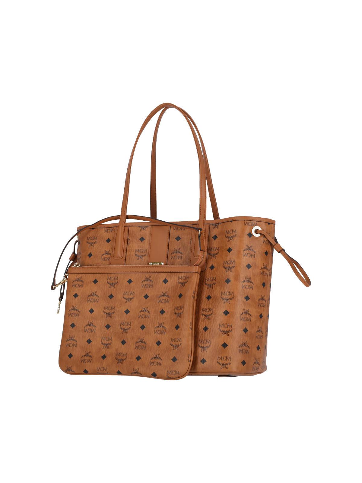トートバッグ Mcm Reversible Small Tote Bag With Monogram Print Mini Himmel Shopper in Embossed Logo Leather Black | MCM ®US