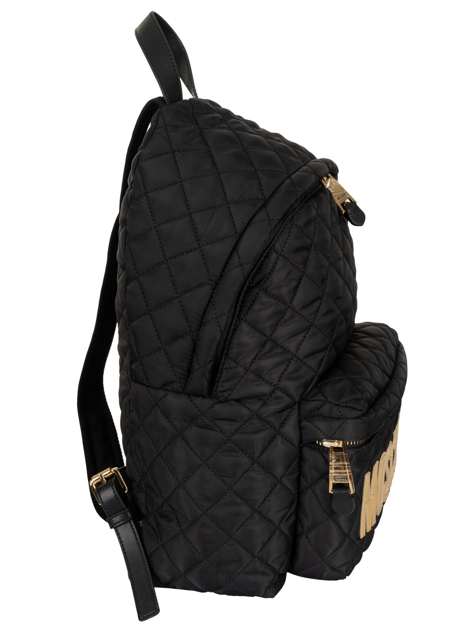 Moschino logo-plaque Quilted Backpack - Farfetch