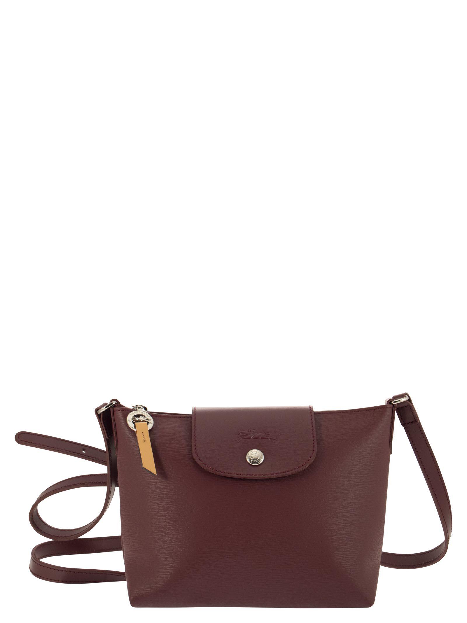 Sac a store main longchamp bandouliere