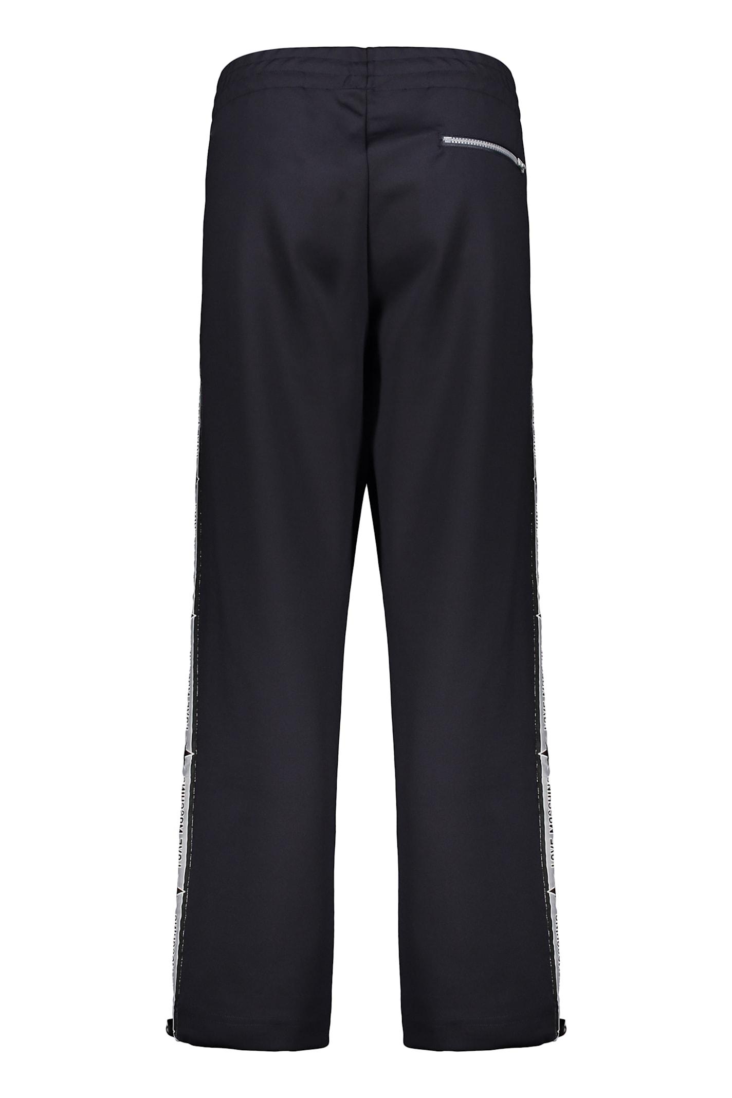 【送料&関税込】Moschino Track-pants With Side Logo Stripes Moschino Track-pants With Side Logo Stripes In Black | ModeSens