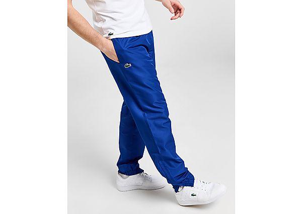 Blue lacoste guppy pants best sale
